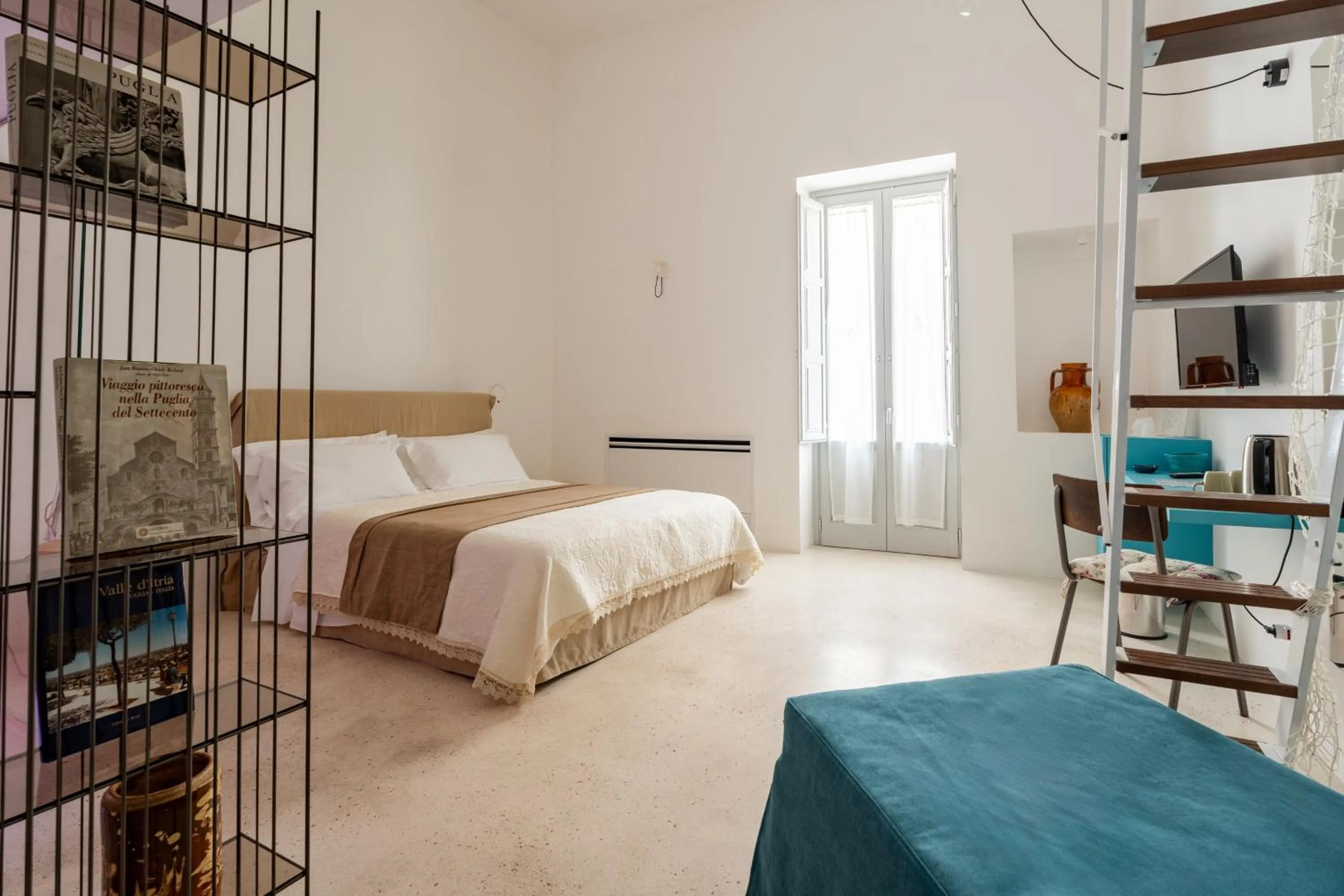 Bed in Donna Domenica Boutique Suites