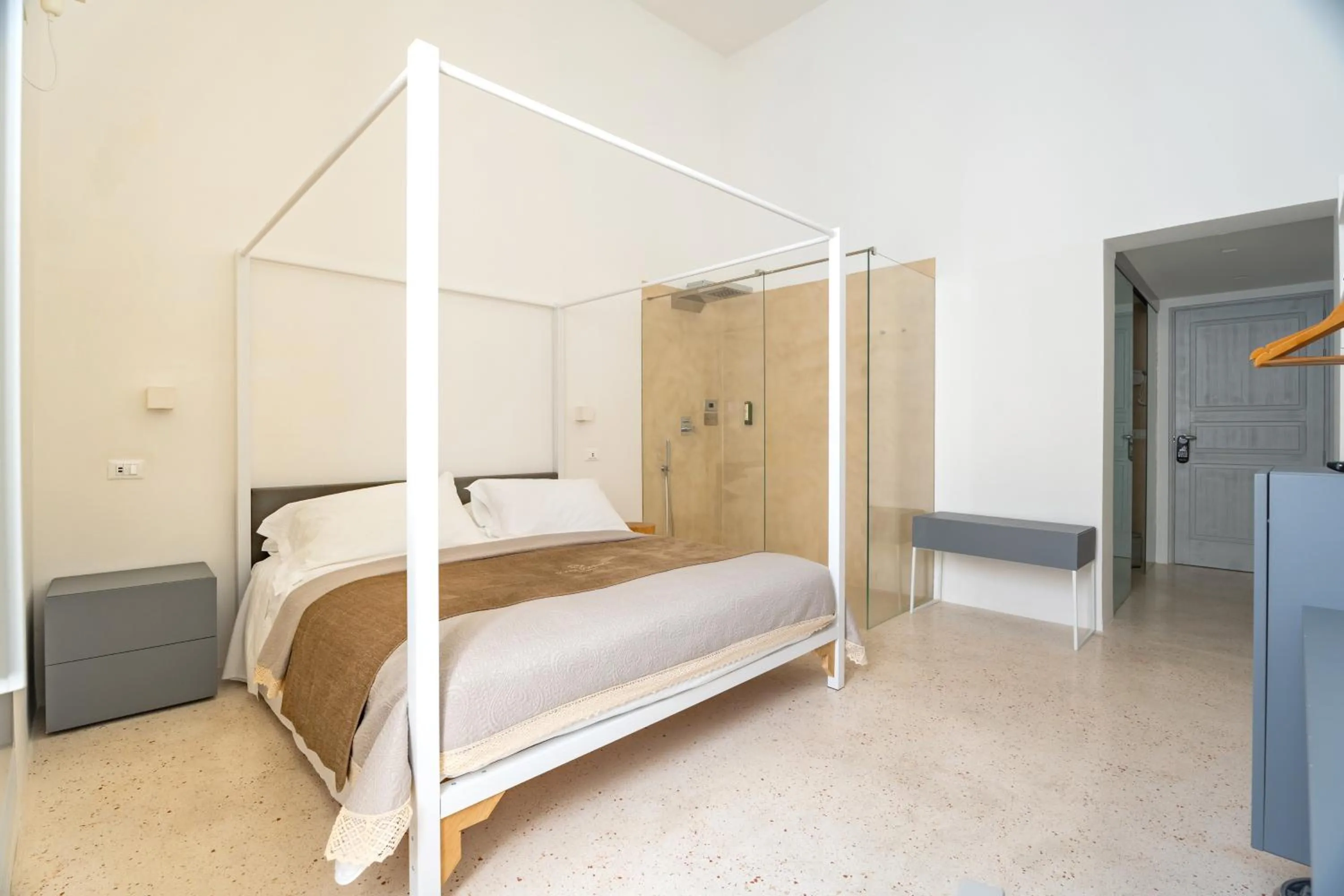 Bed in Donna Domenica Boutique Suites