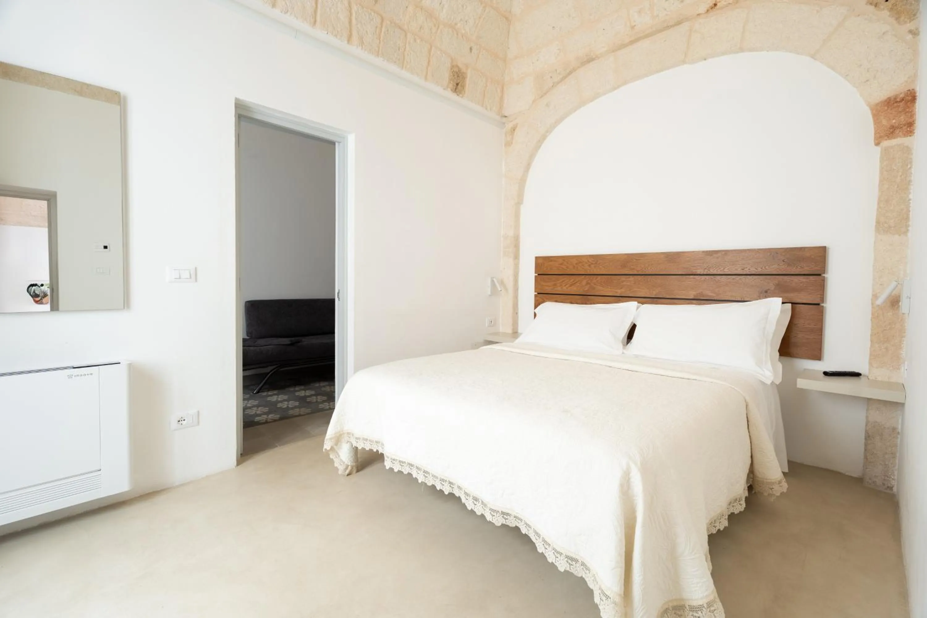 Bed in Donna Domenica Boutique Suites