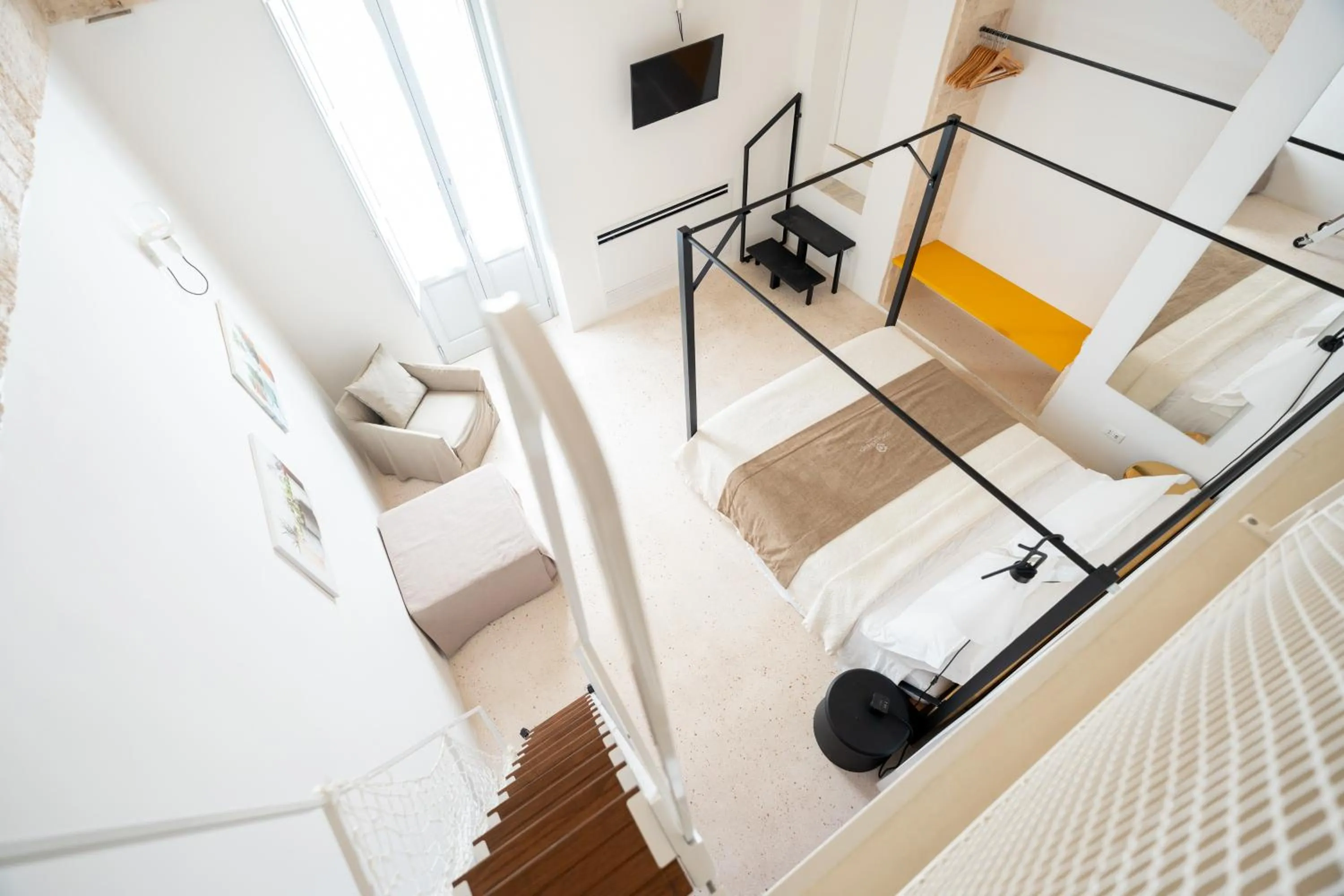 Bed in Donna Domenica Boutique Suites