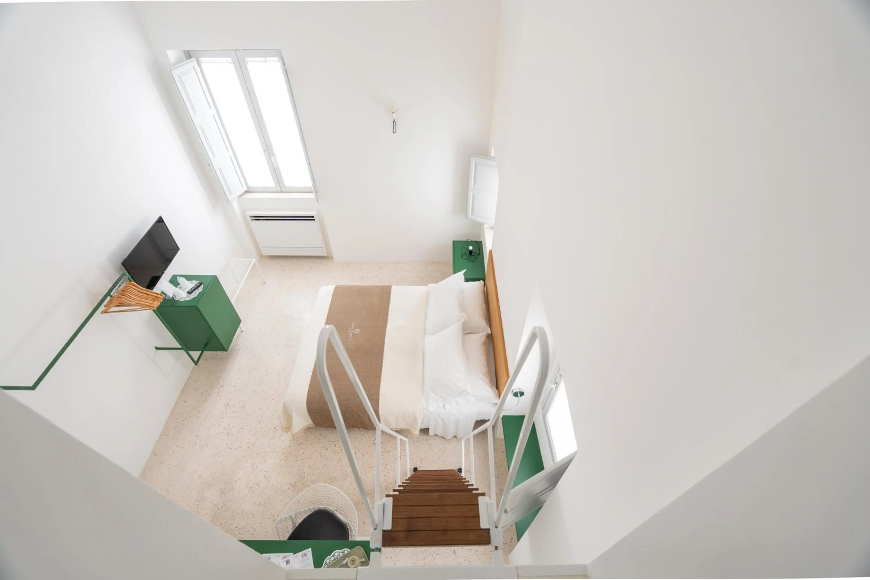 Bed in Donna Domenica Boutique Suites