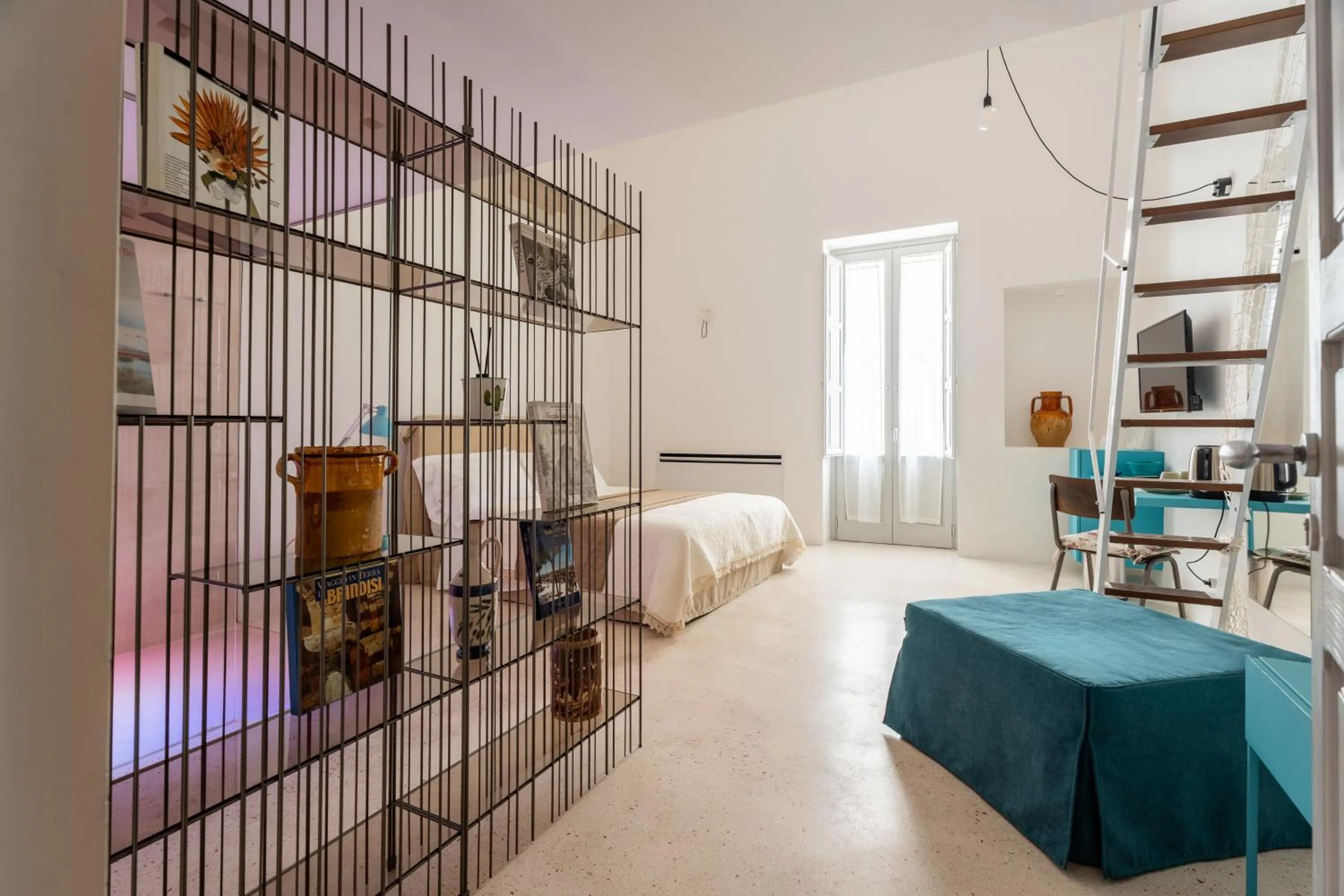 Bed in Donna Domenica Boutique Suites