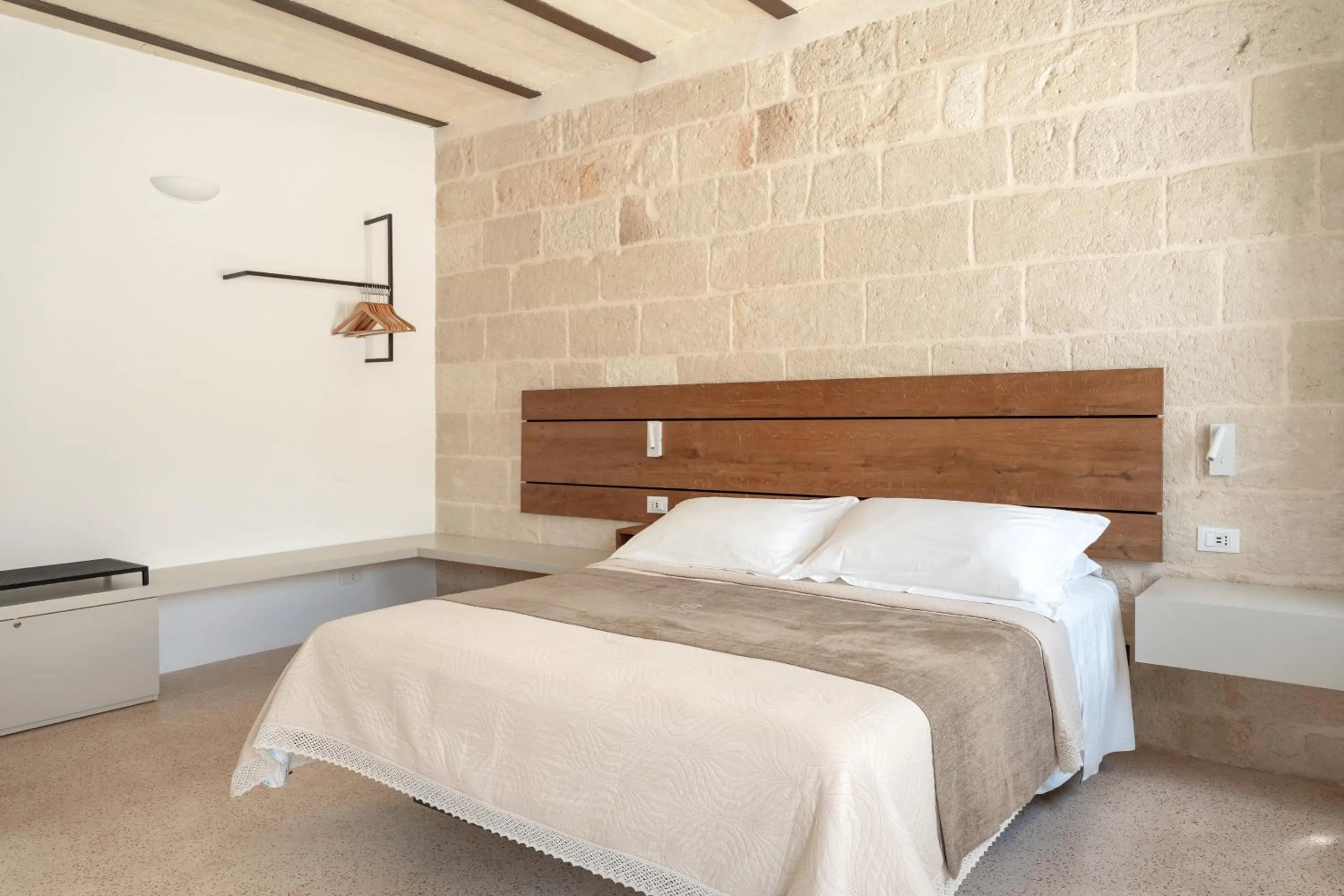 Bed in Donna Domenica Boutique Suites