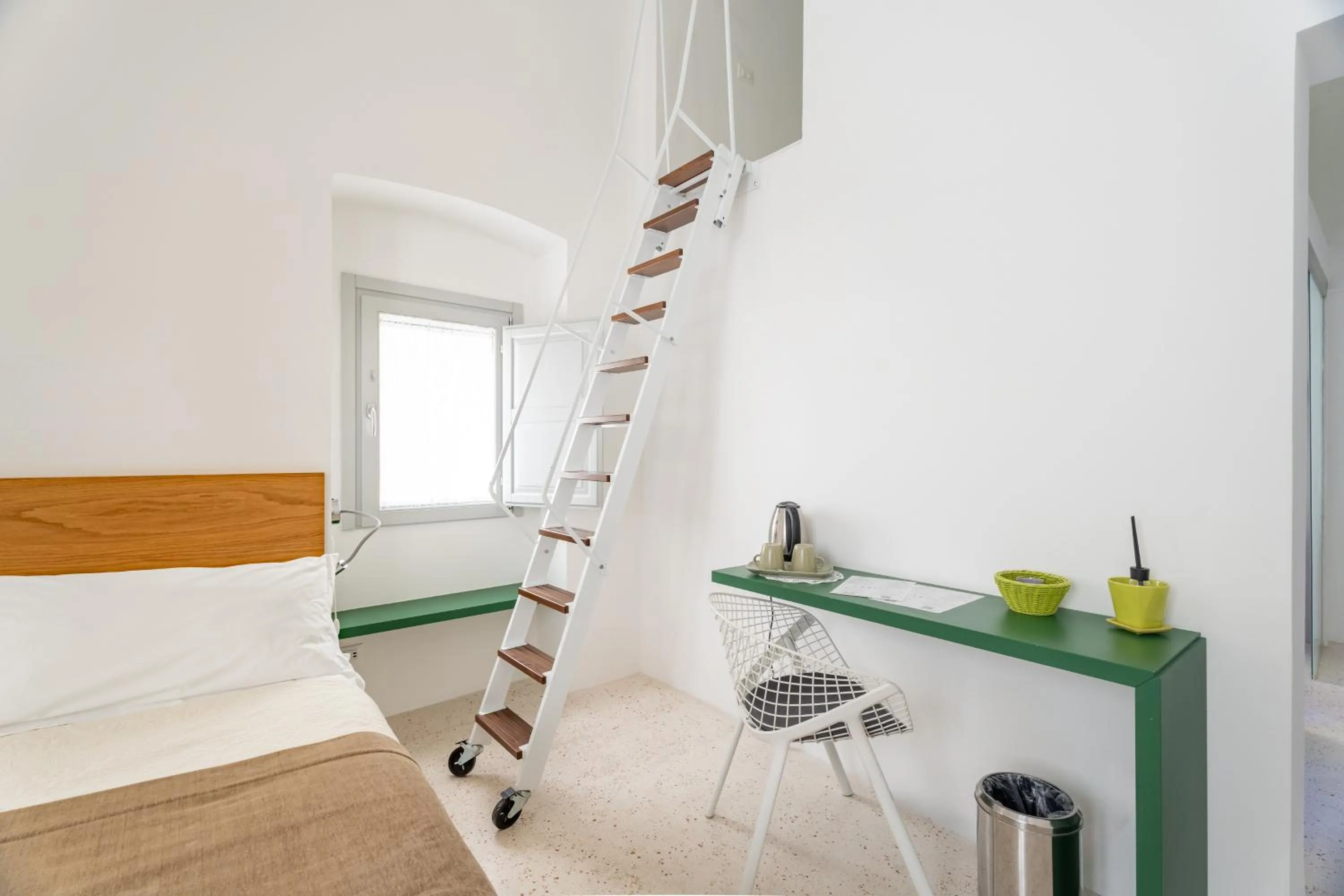 Bed in Donna Domenica Boutique Suites