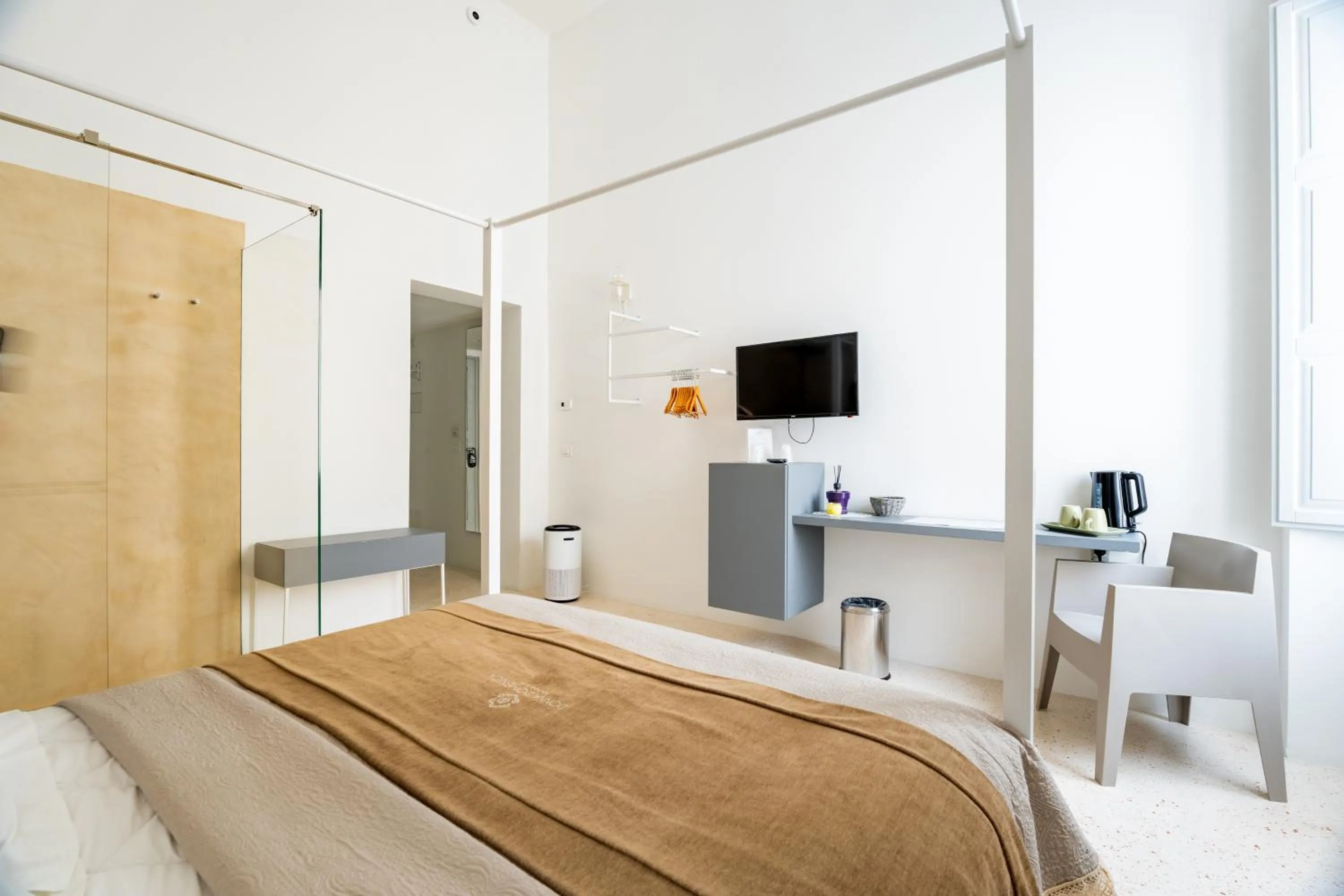 Bed in Donna Domenica Boutique Suites