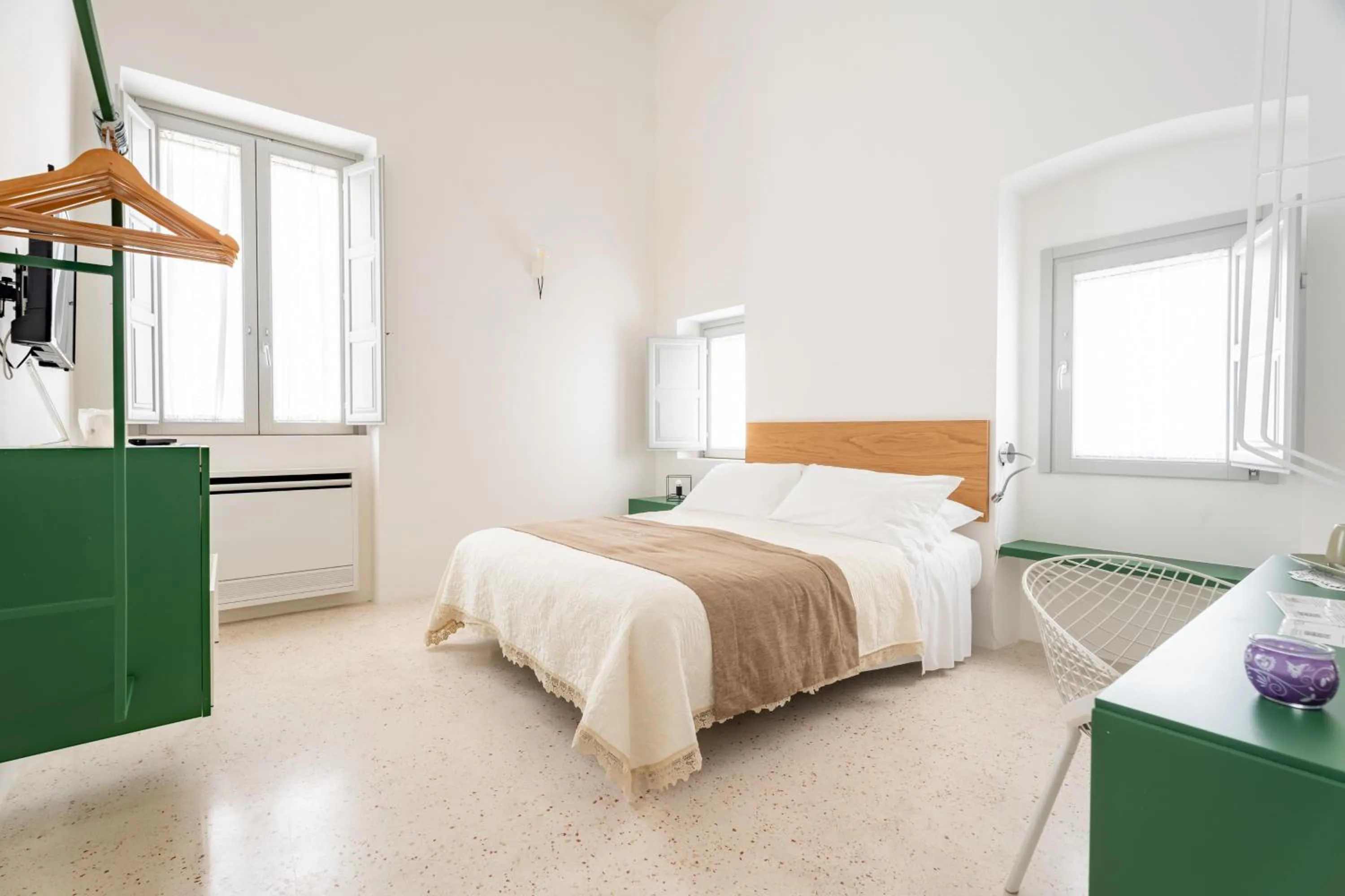 Bed in Donna Domenica Boutique Suites