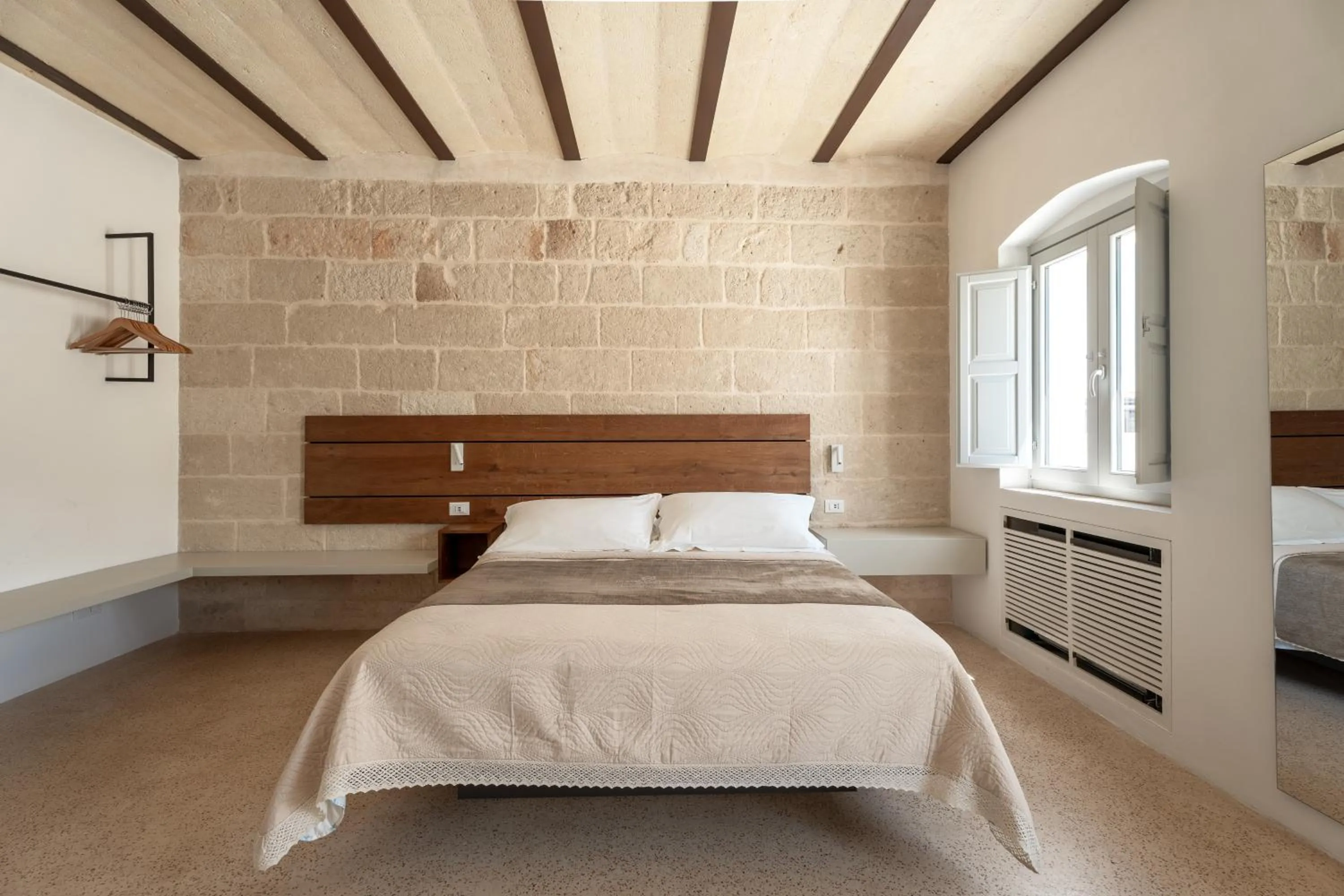 Bed in Donna Domenica Boutique Suites