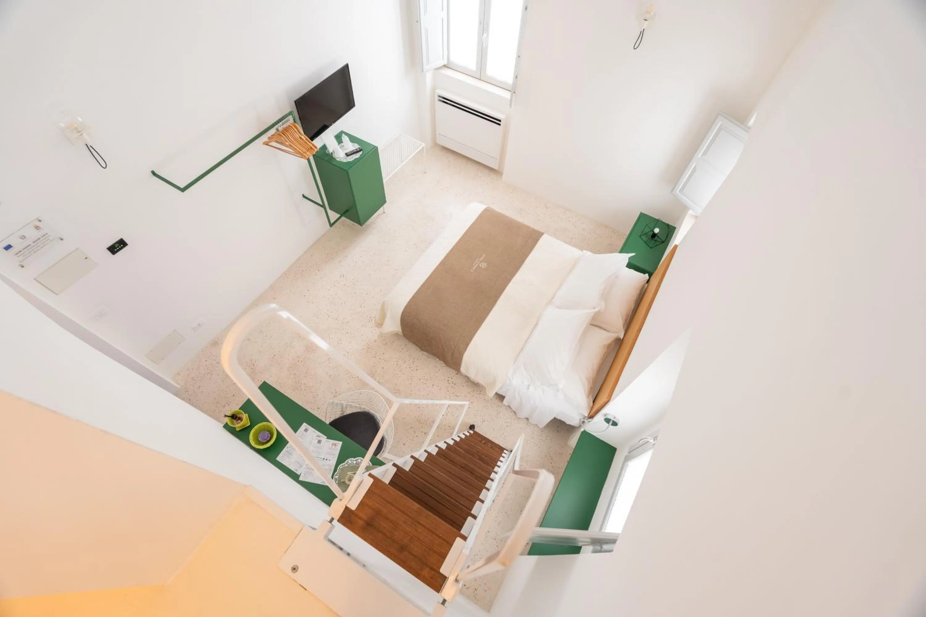 Bed in Donna Domenica Boutique Suites