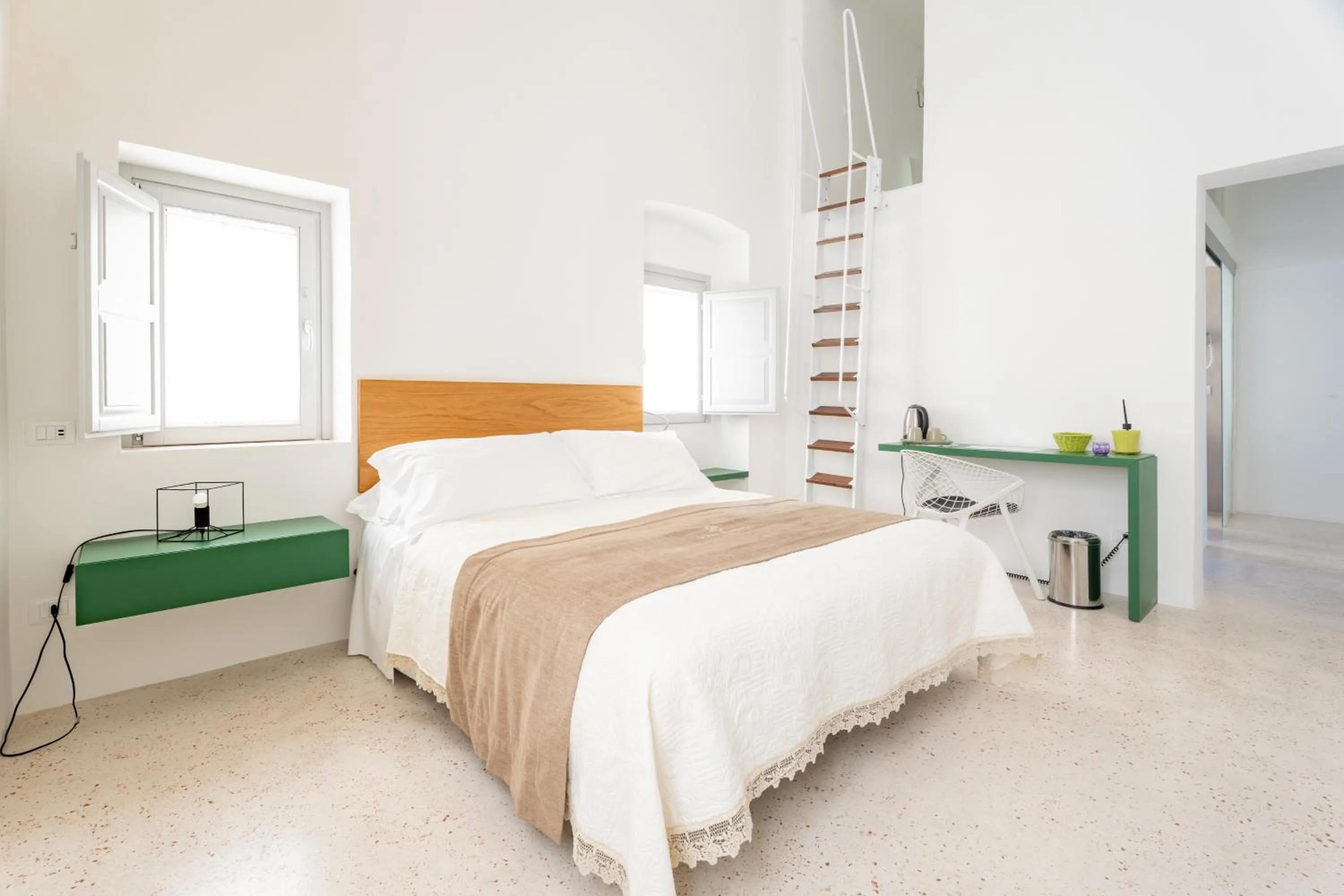 Bed in Donna Domenica Boutique Suites