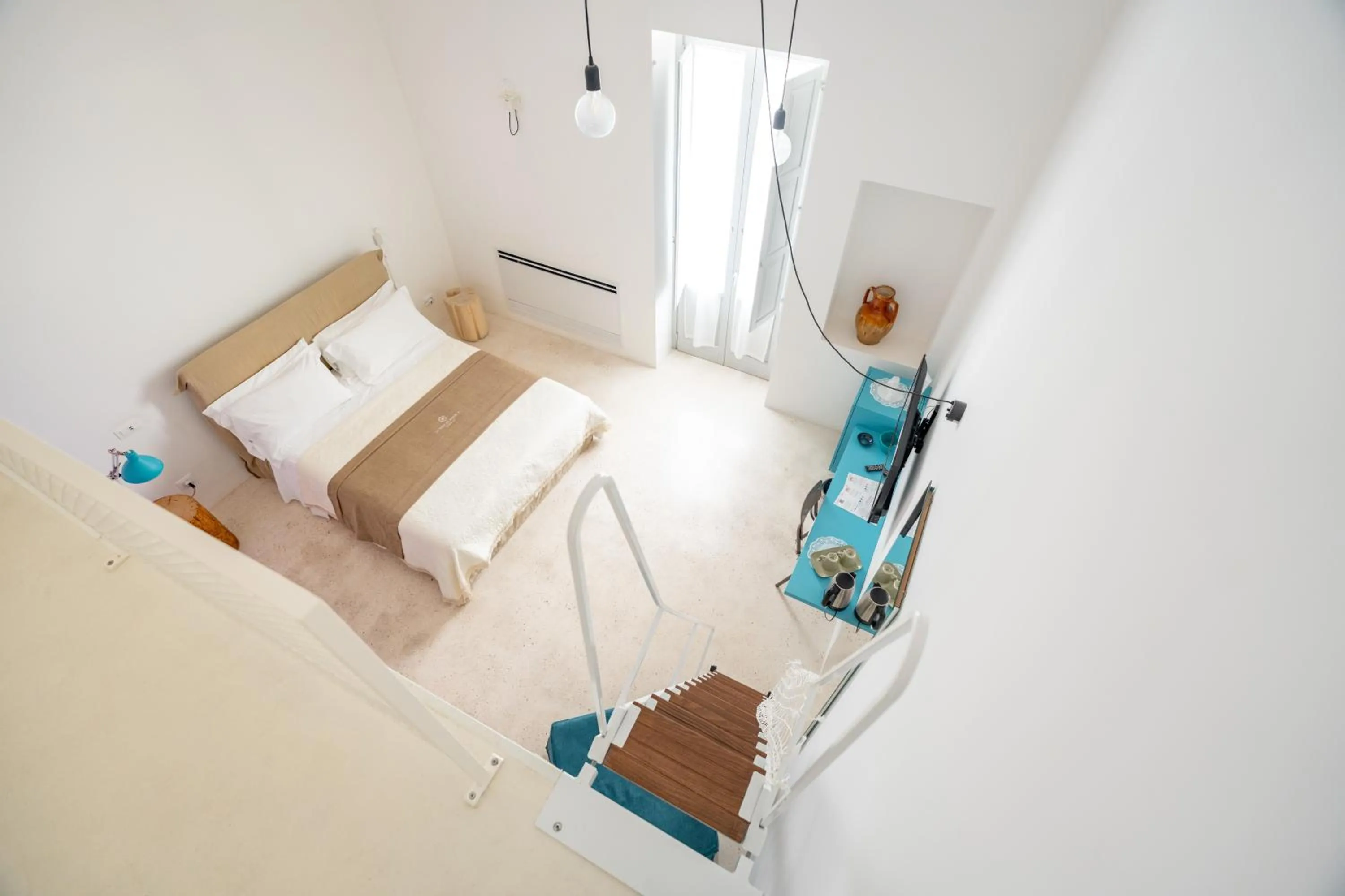 Bed in Donna Domenica Boutique Suites