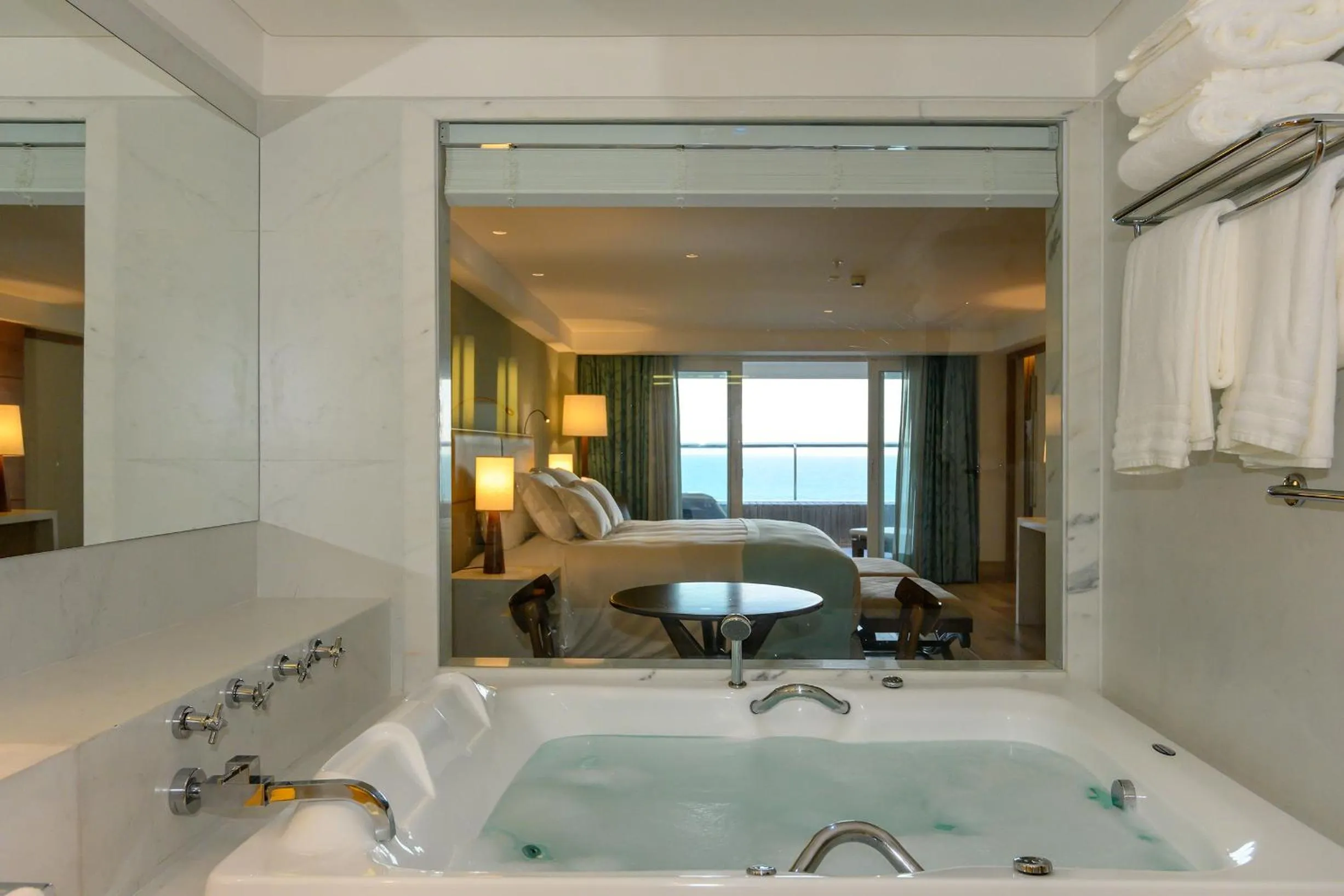 Bed in Vogal Luxury Beach Hotel & SPA