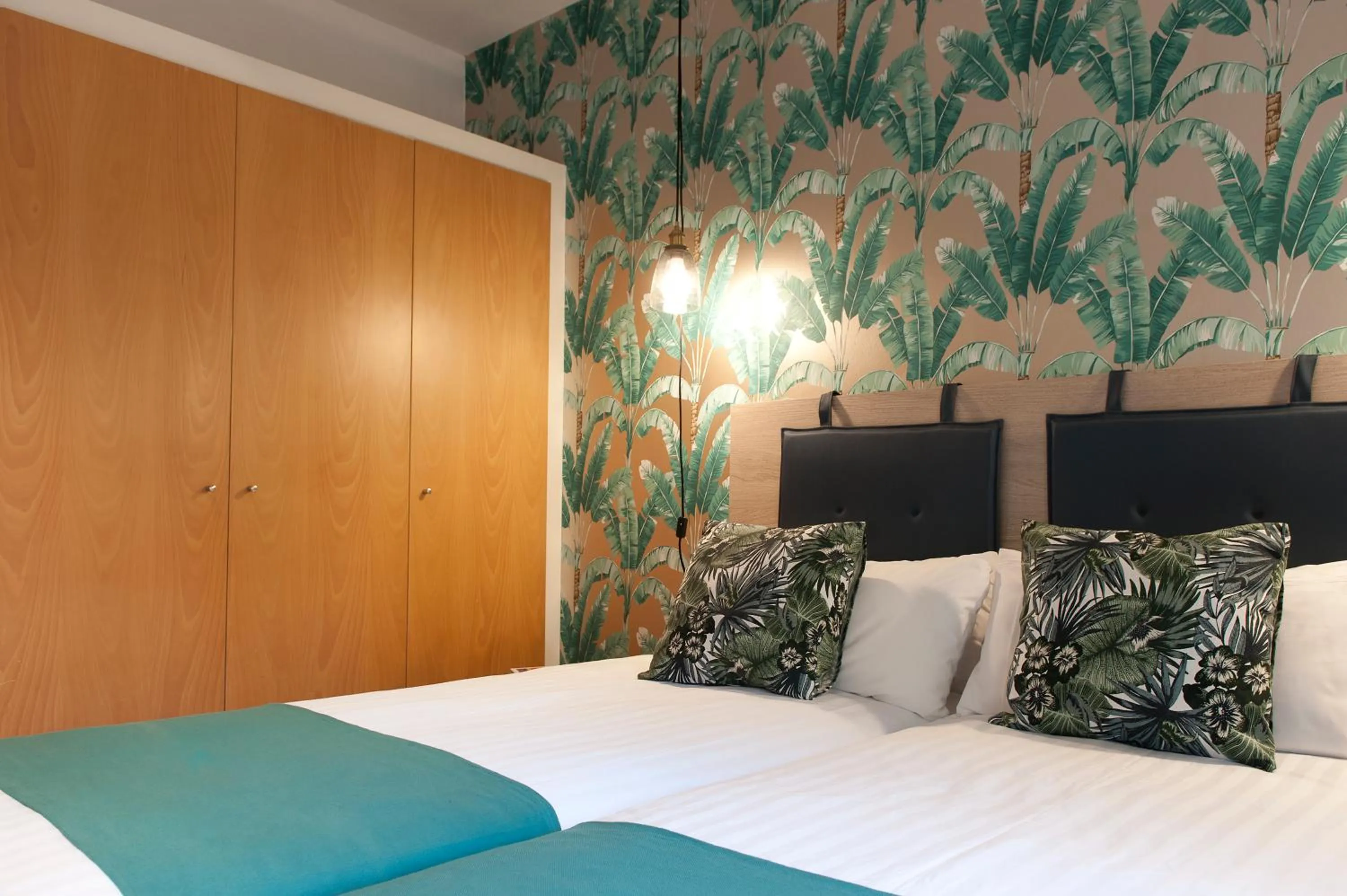 Bedroom, Bed in MH Apartments Sant Pau