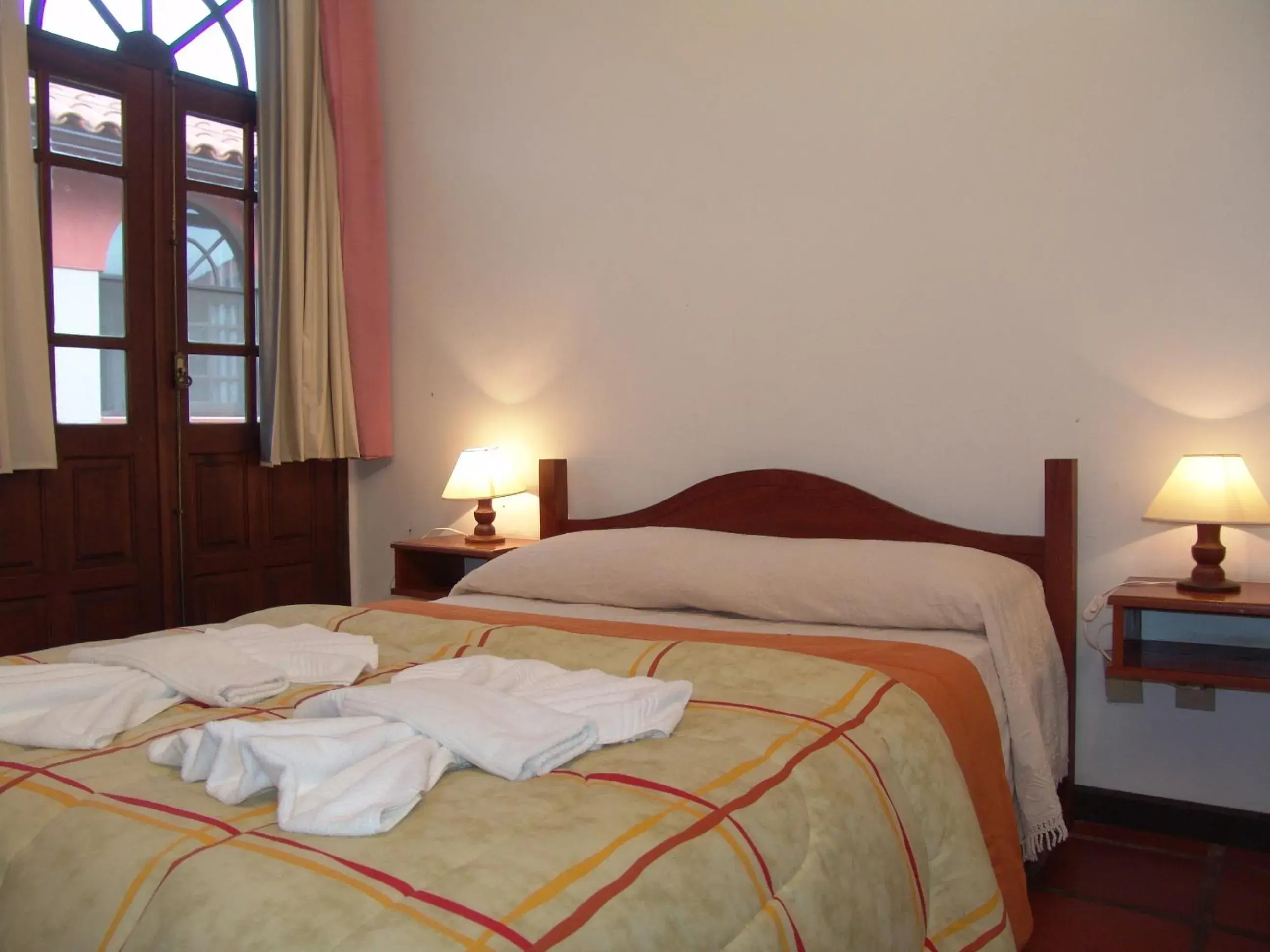 Bed in La Alhambra Apart Hotel Bed in La Alhambra Apart Hotel