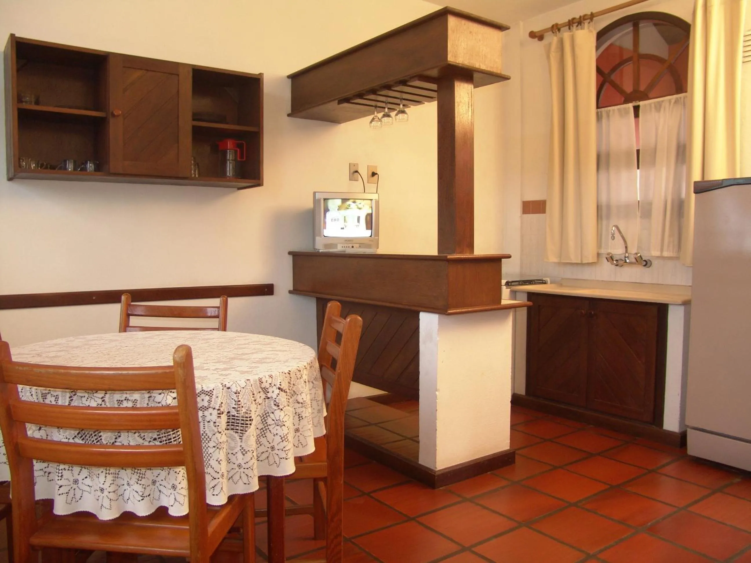 Kitchen or kitchenette in La Alhambra Apart Hotel