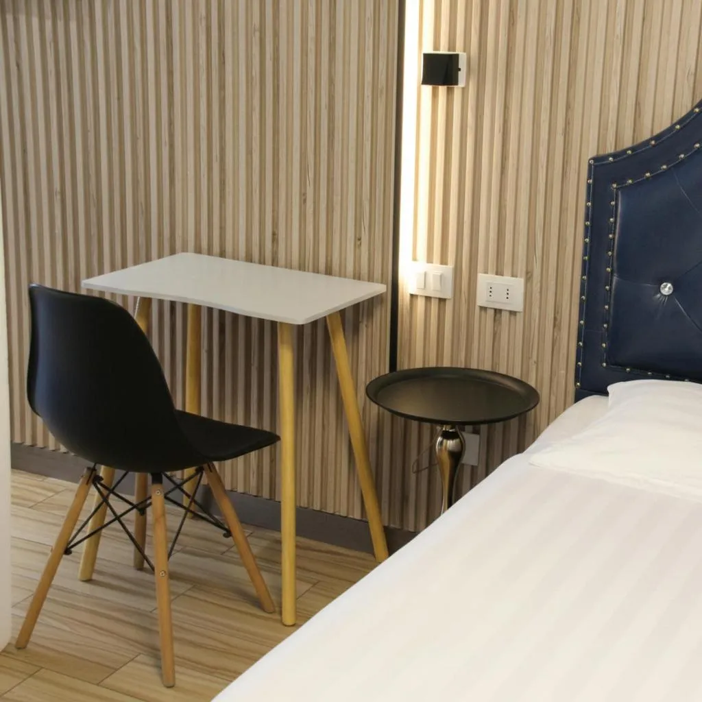 Bed in Hotel Boutique Holitel