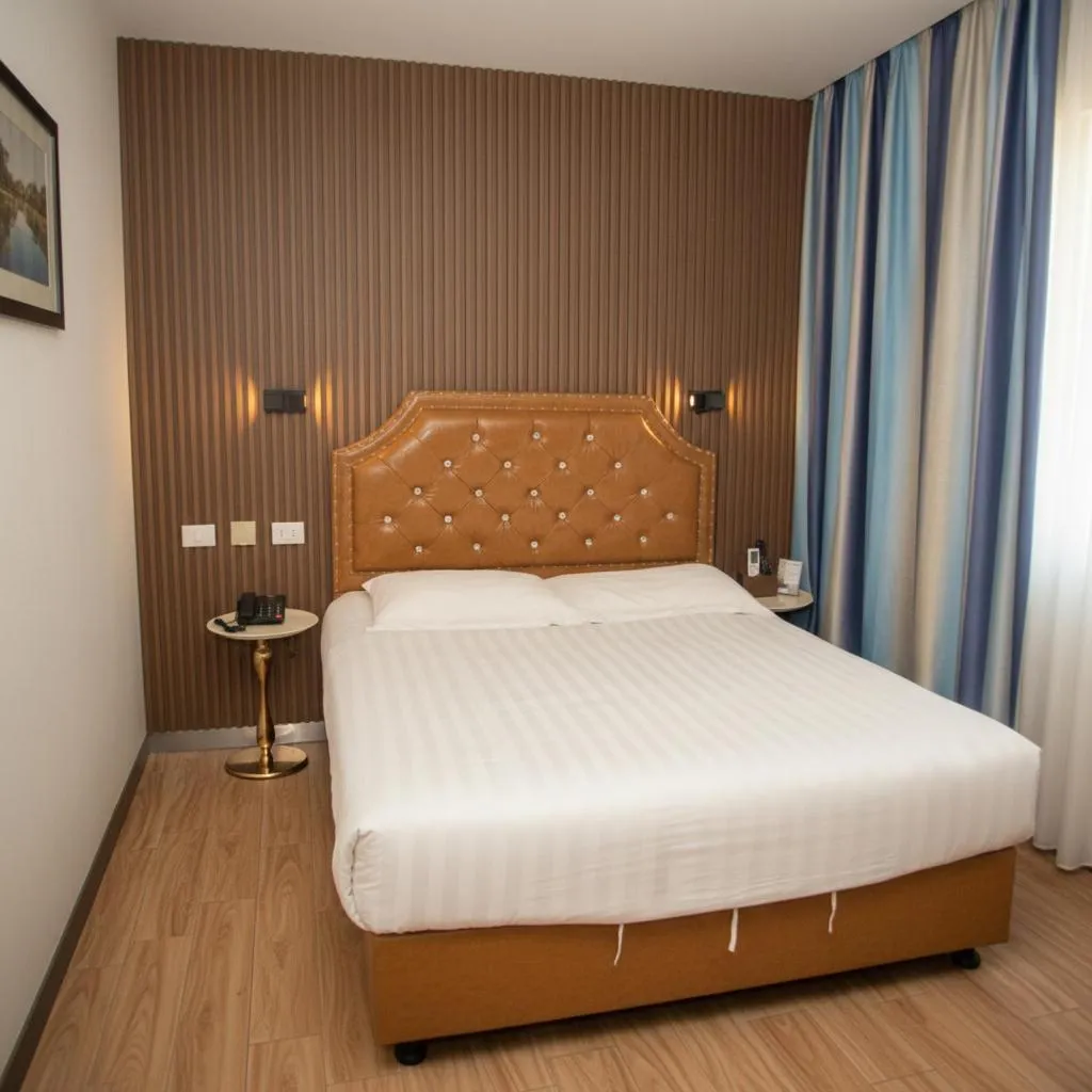 Bed in Hotel Boutique Holitel