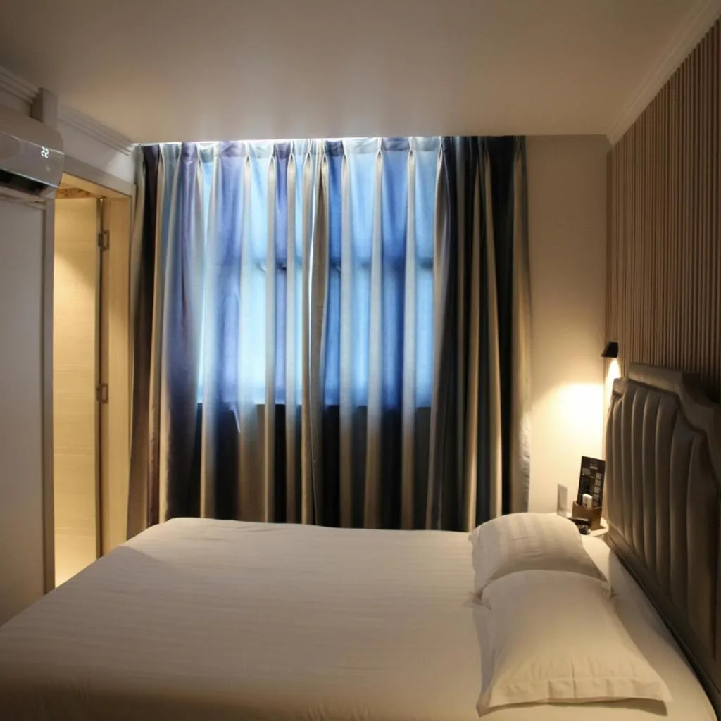 Bed in Hotel Boutique Holitel