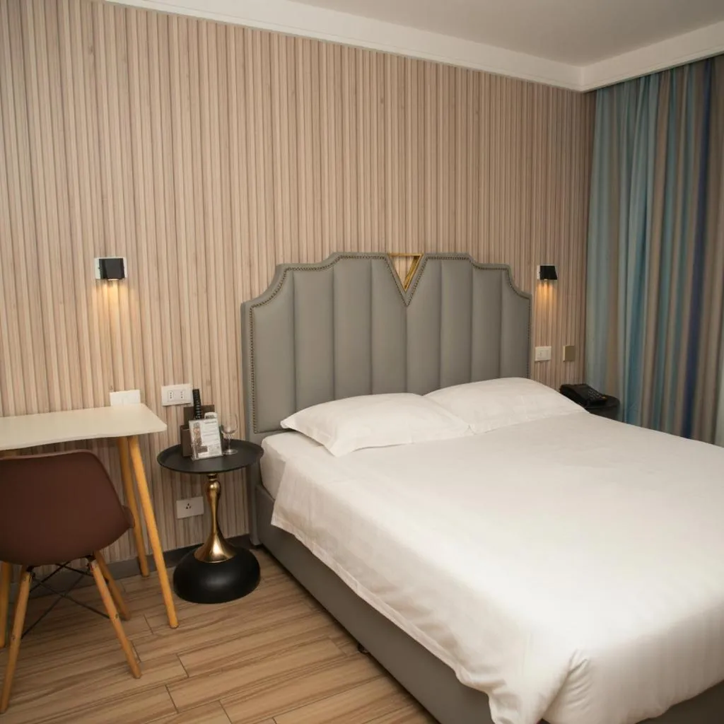 Bed in Hotel Boutique Holitel