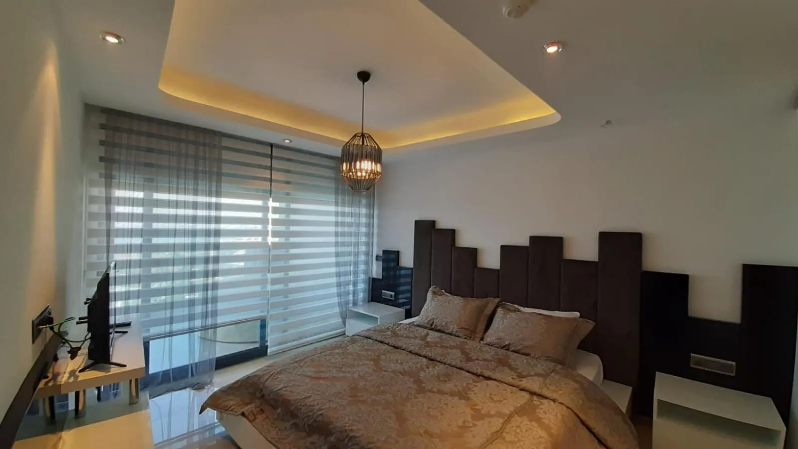 Bed in Elite Luxury Suite & Spa