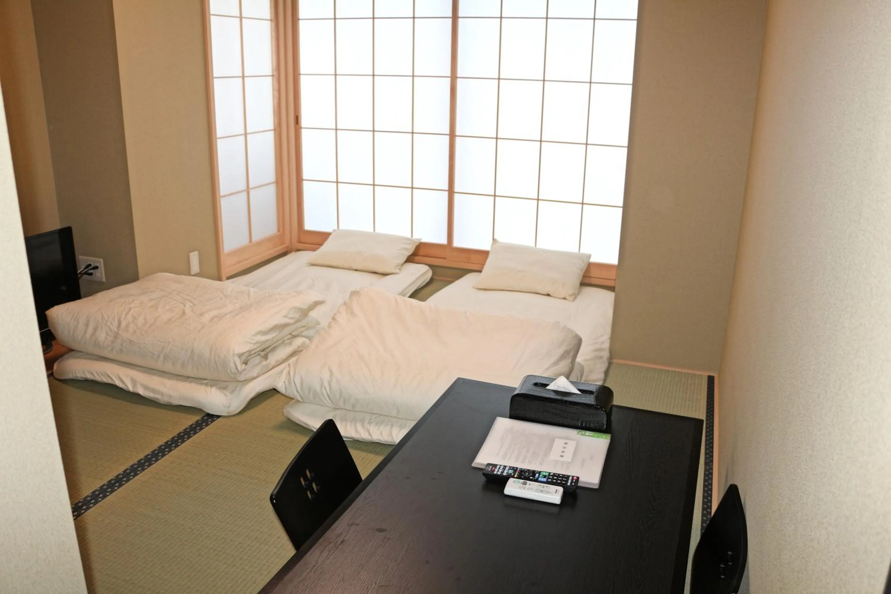 Bed in Akihabara Nakagawa Inn