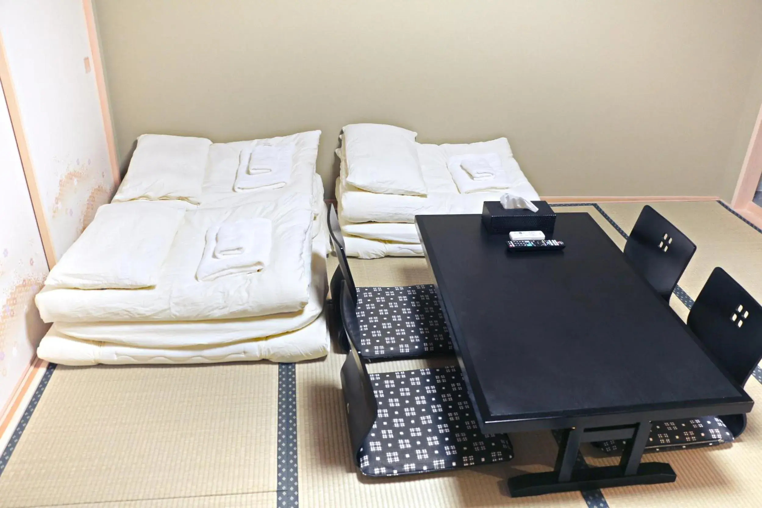 Bed in Akihabara Nakagawa Inn Bed in Akihabara Nakagawa Inn