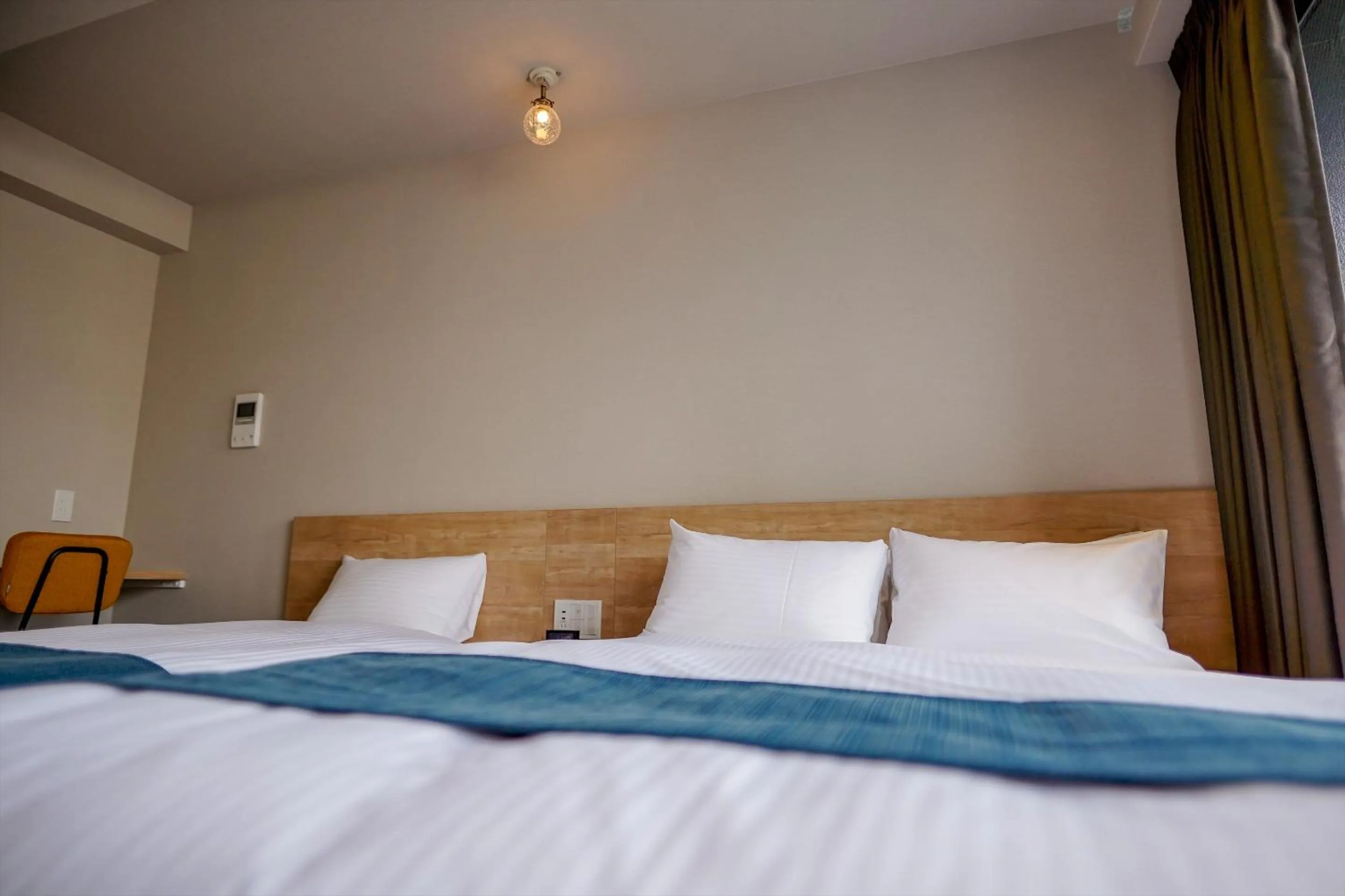 Bed in RESI STAY Heart