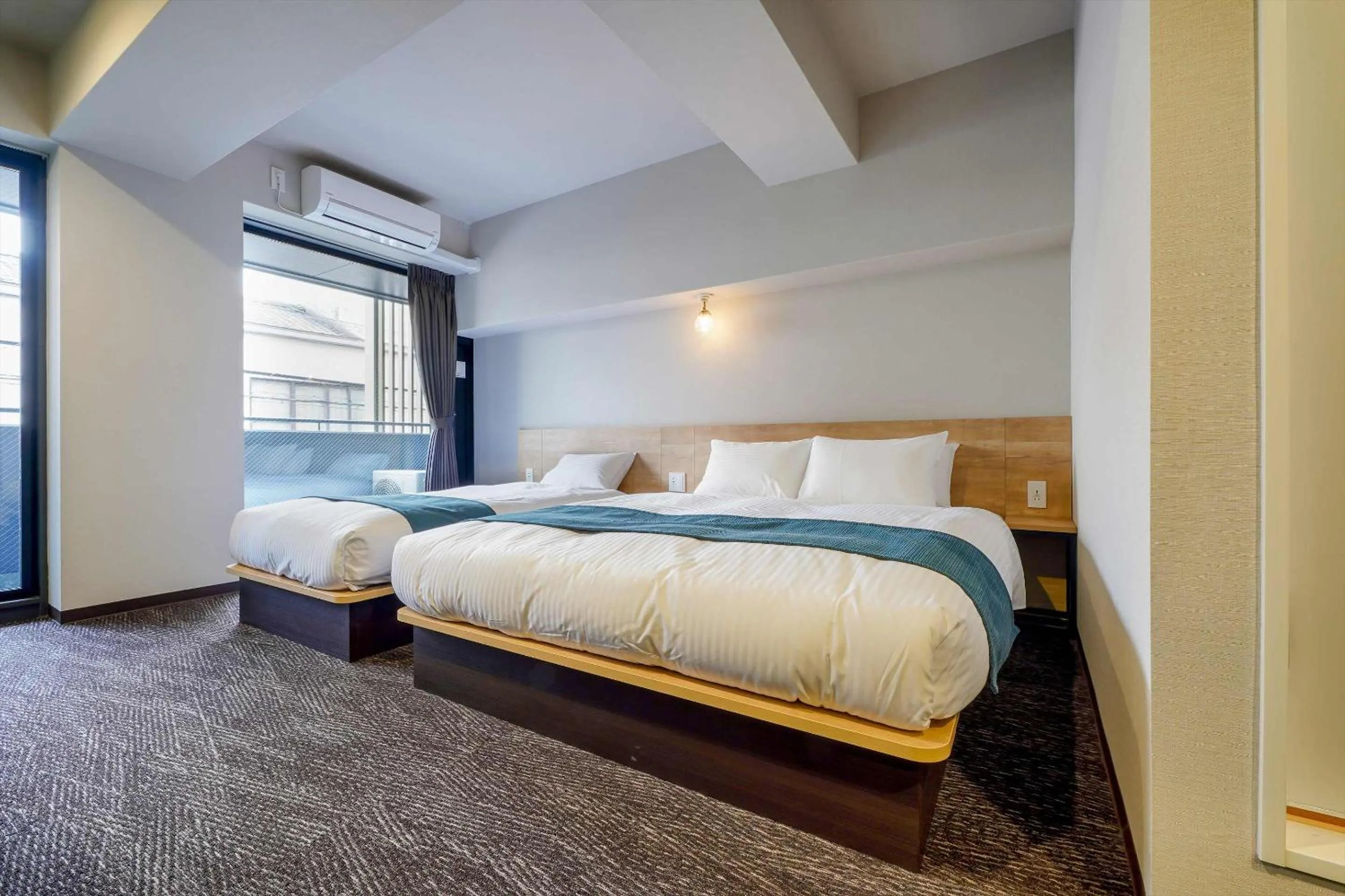 Bed in RESI STAY Heart