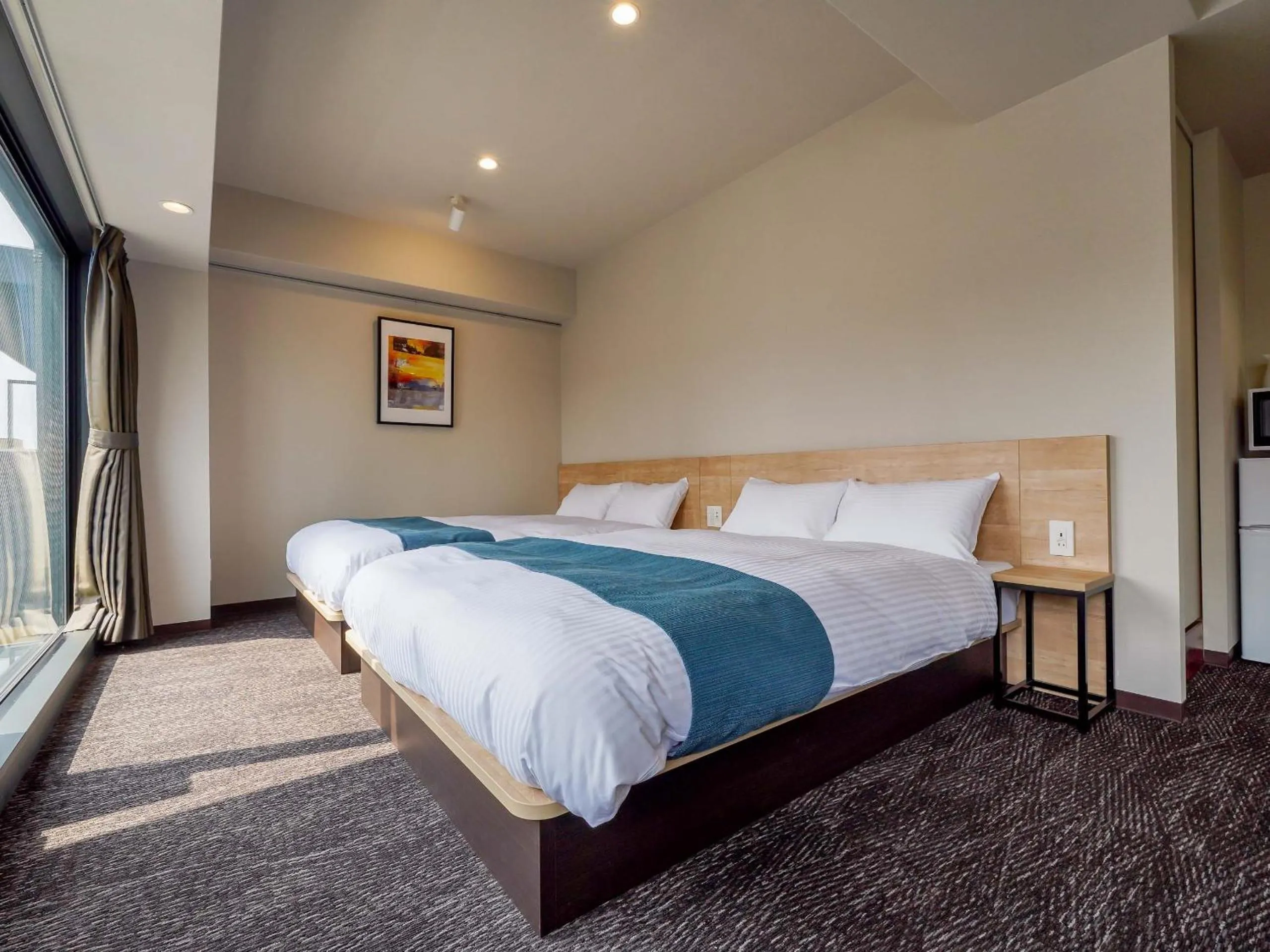 Bed in RESI STAY Heart