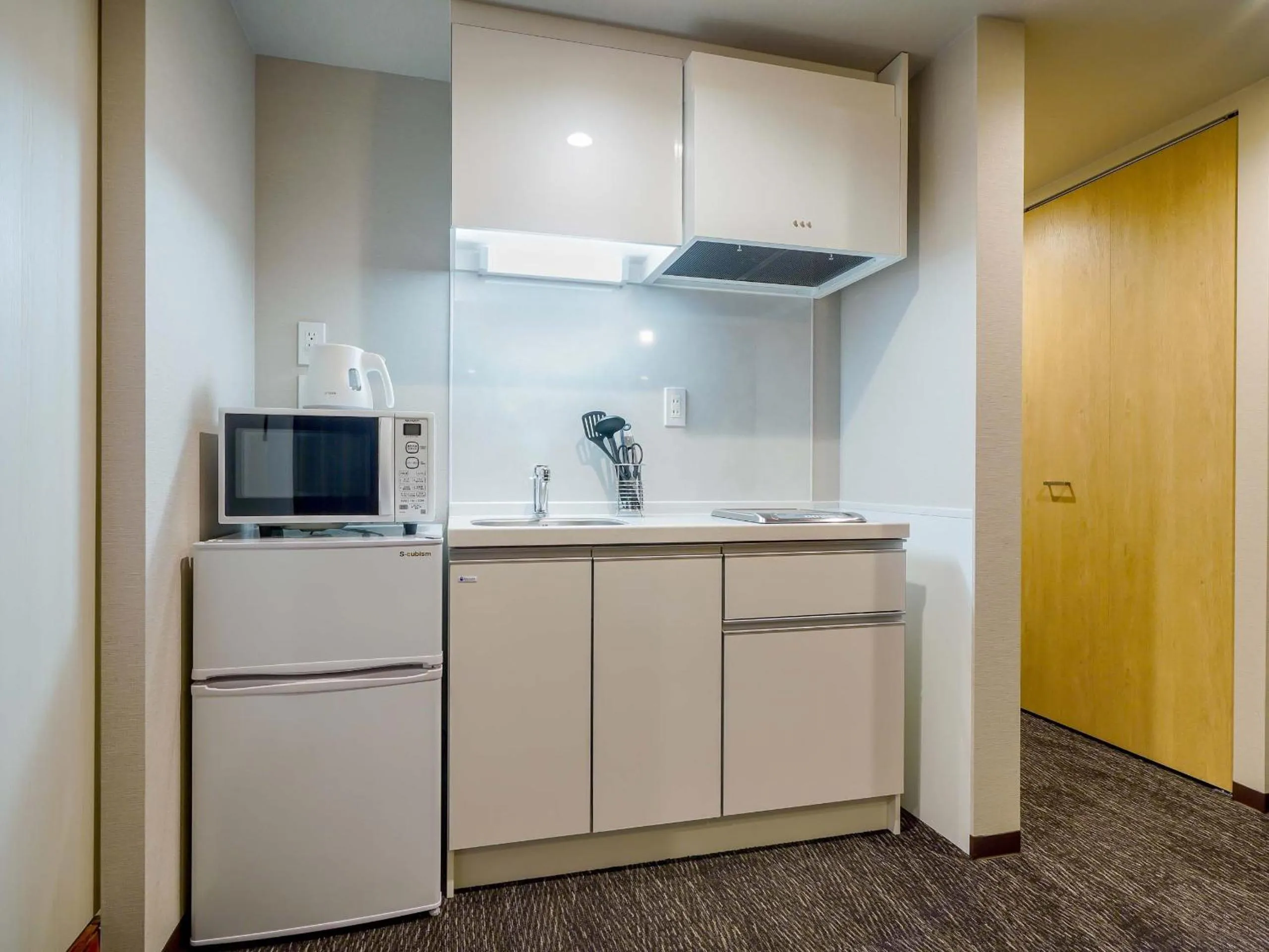 Kitchen or kitchenette in RESI STAY Heart