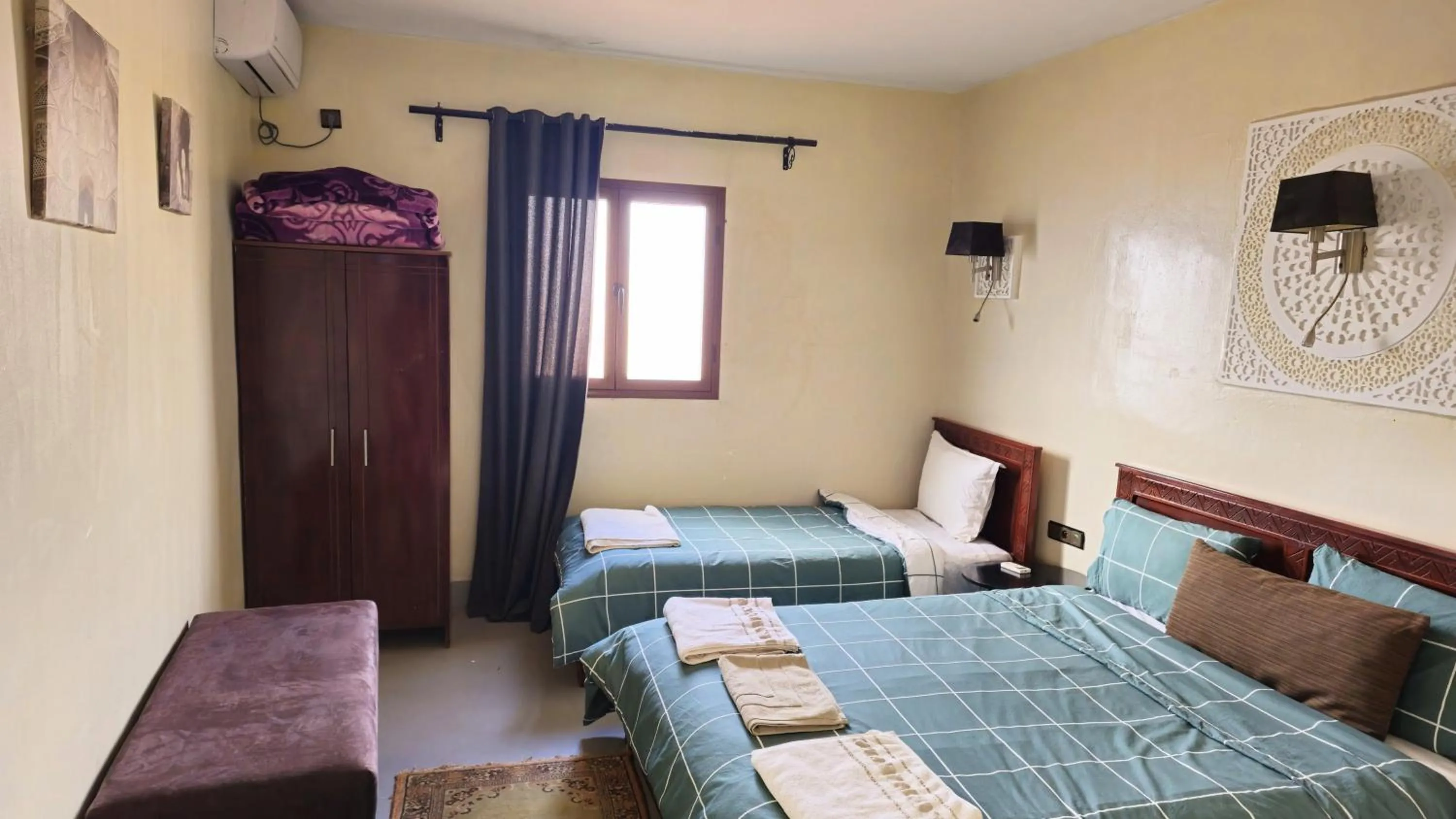 Bed in Tizi Maison d'Hôtes