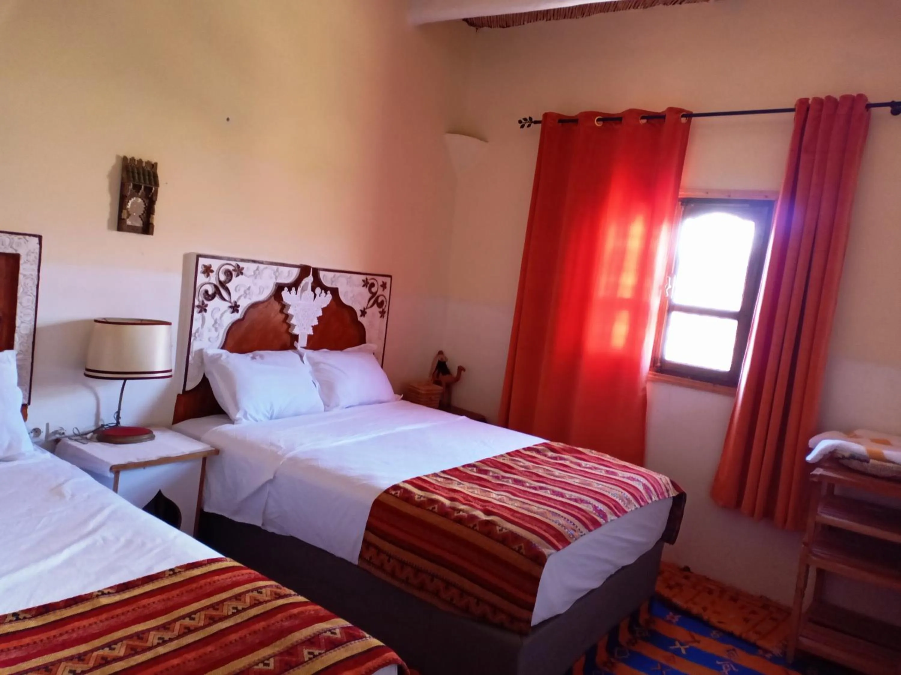 Bed in Tizi Maison d'Hôtes