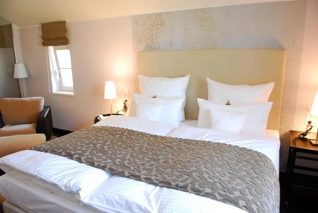 Bed in Hotel Seezeichen Ahrenshoop