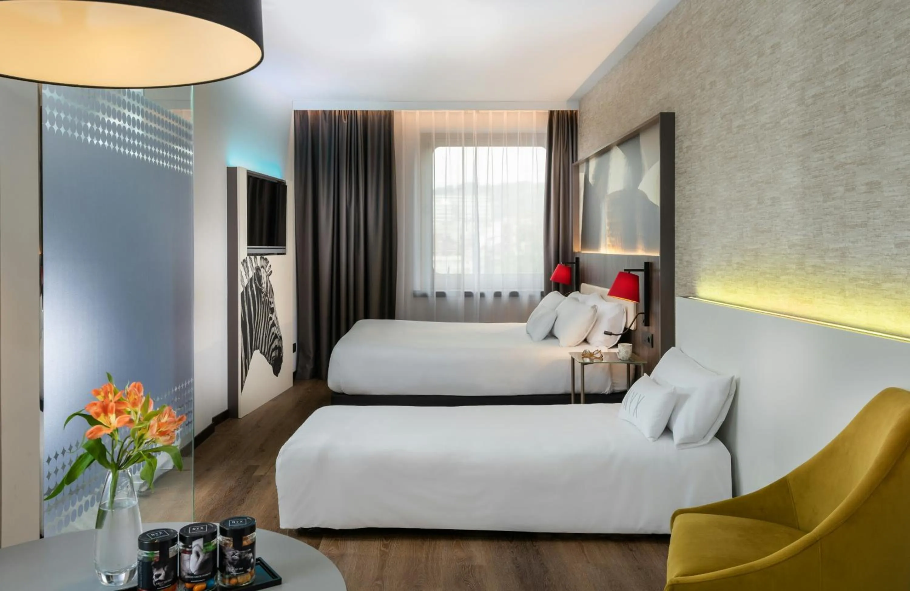 Photo of the whole room, Bed in NYX Hotel Bilbao by Leonardo Hotels