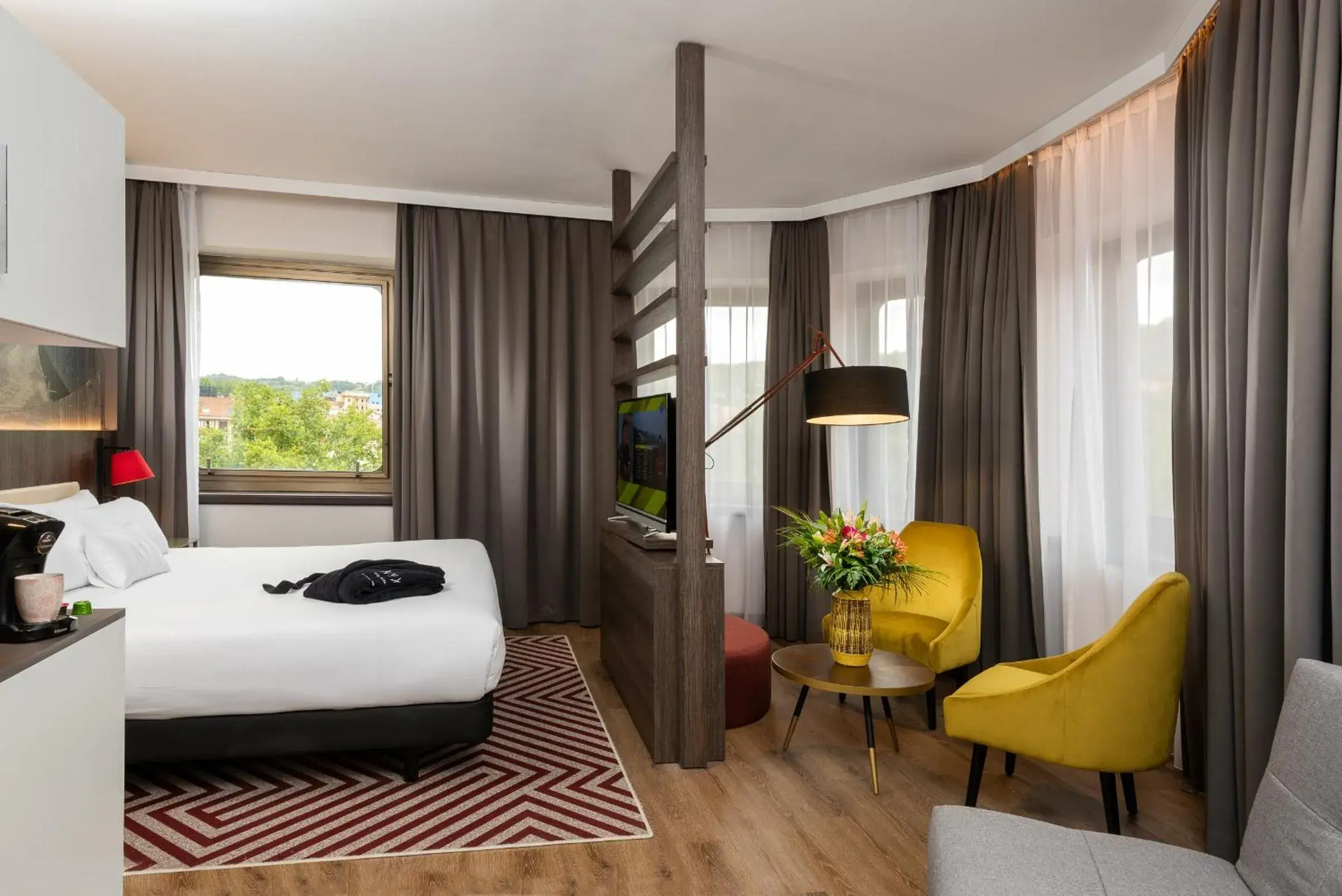 Living room, Bed in NYX Hotel Bilbao by Leonardo Hotels Living room, Bed in NYX Hotel Bilbao by Leonardo Hotels