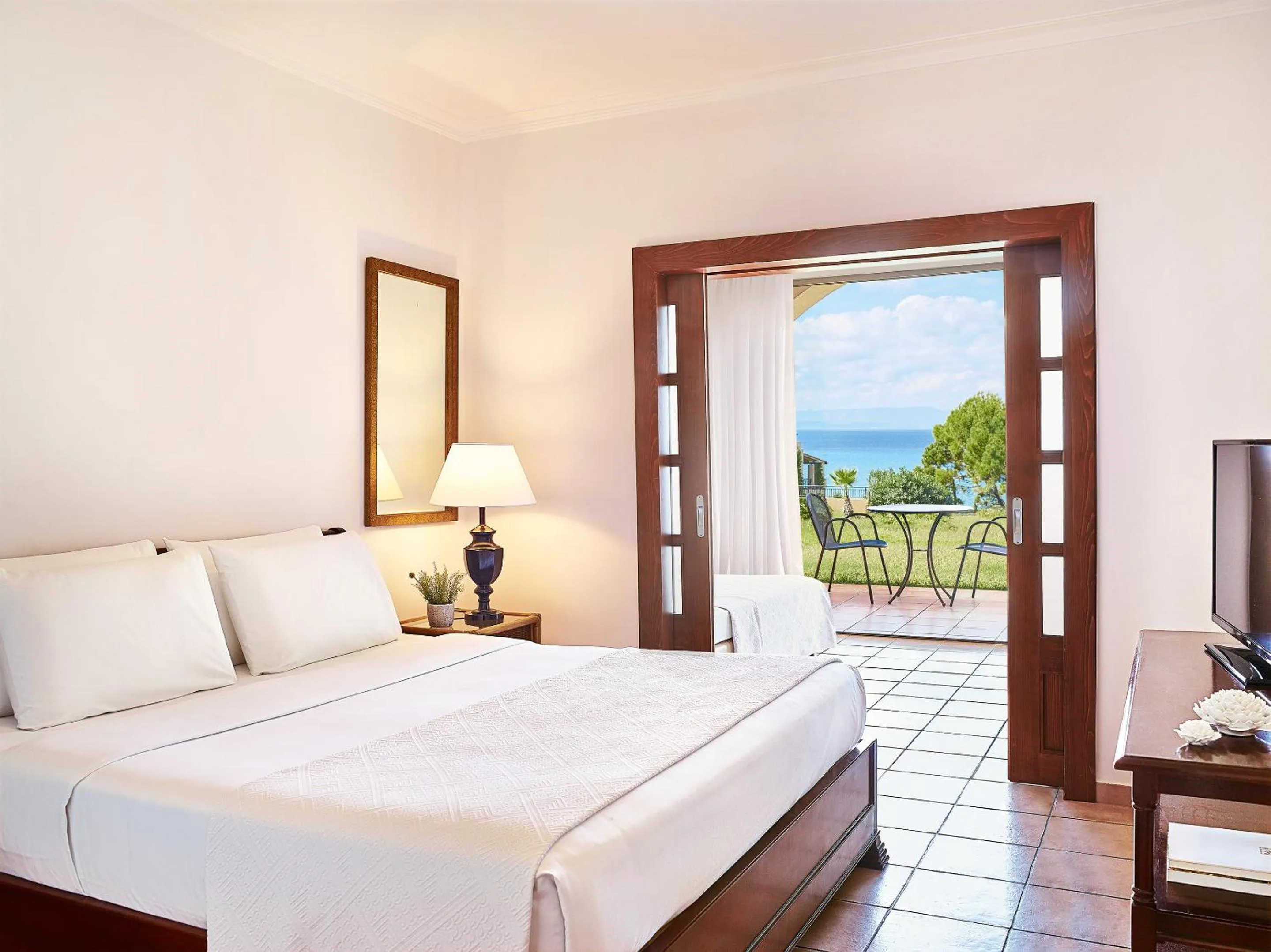 Bed in Grecotel LUXME Oasis at Riviera Olympia & Aqua Park