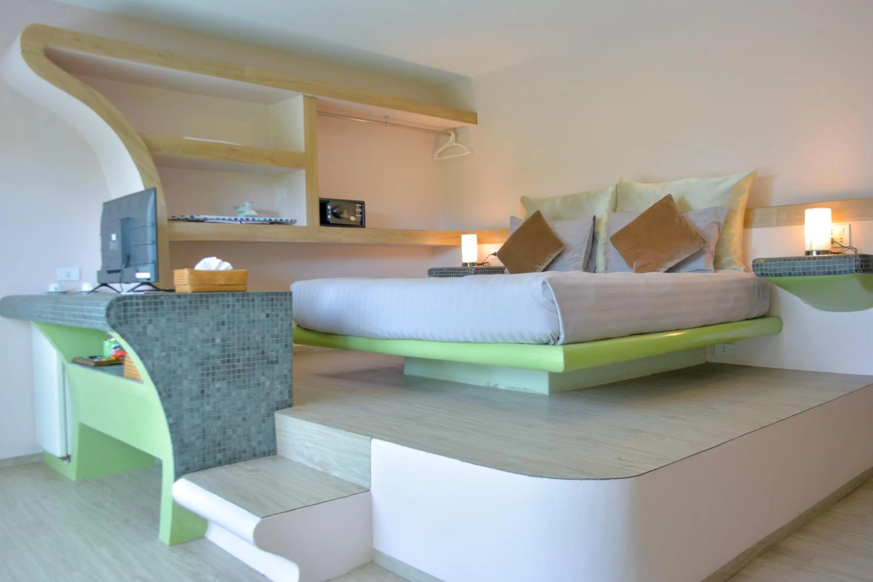 Bed in Le Divine Comedie Beach Resort