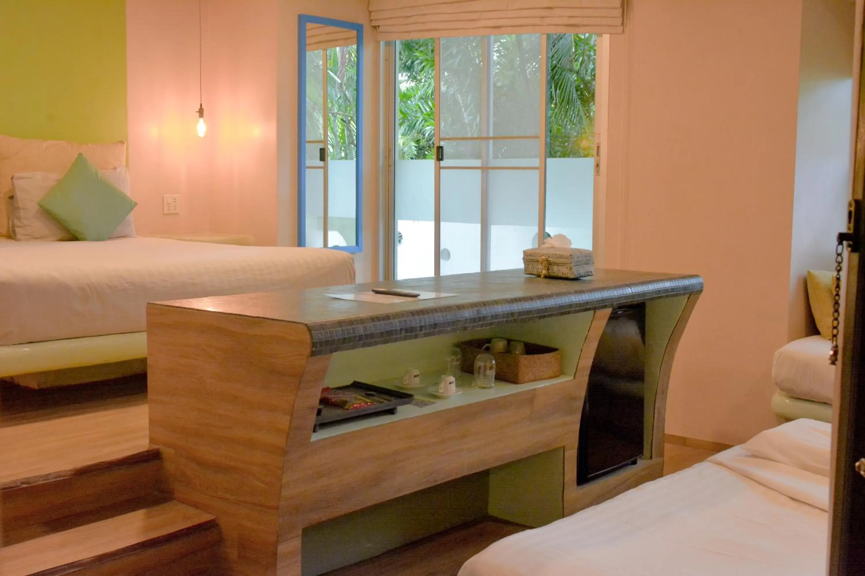 Bed in Le Divine Comedie Beach Resort