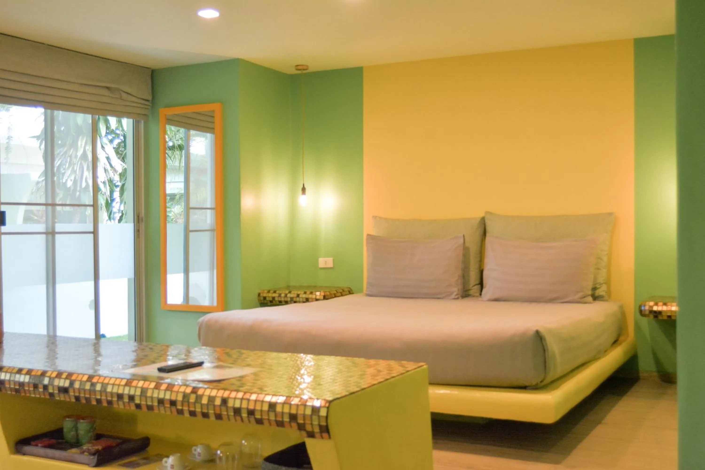 Bed in Le Divine Comedie Beach Resort