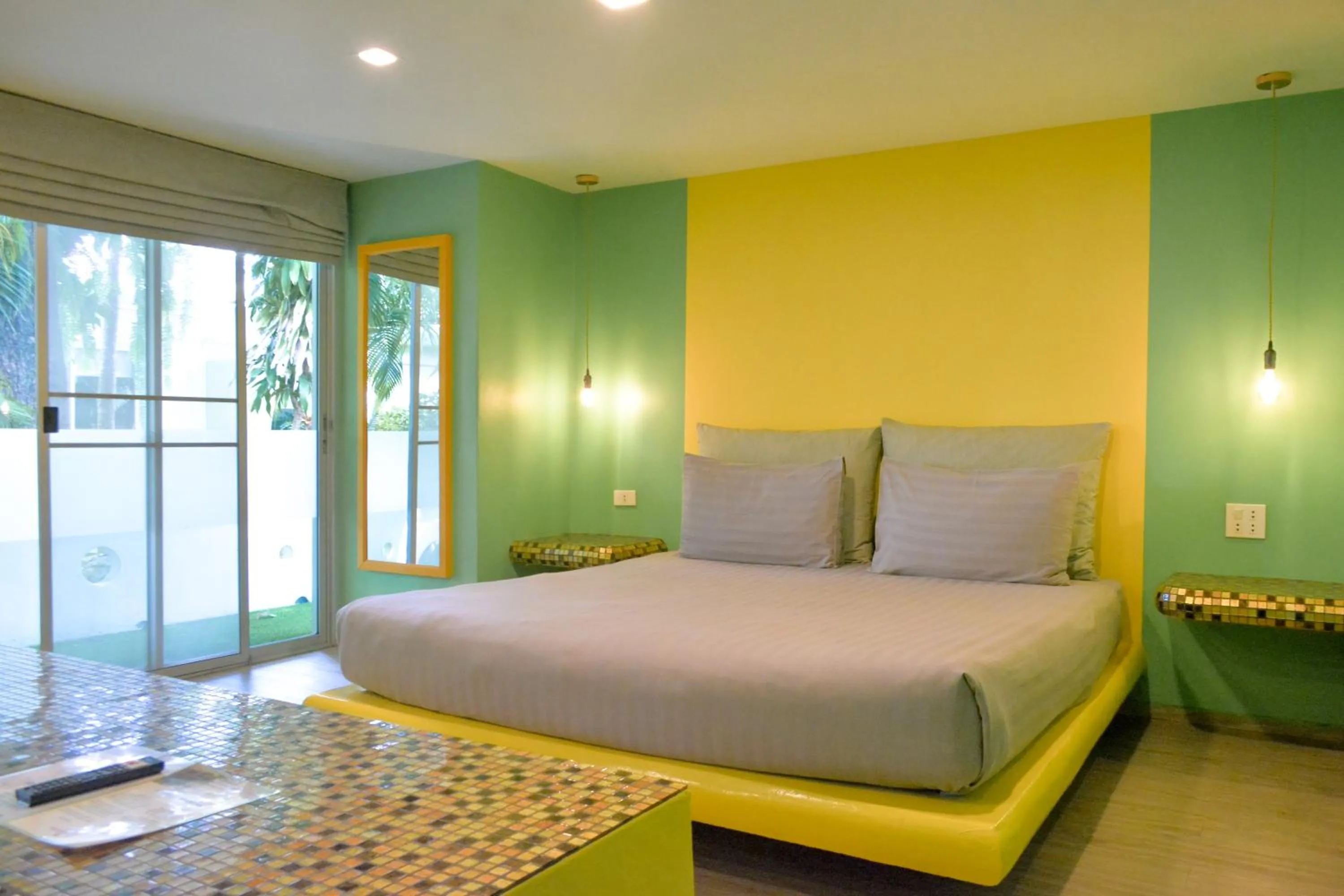 Bed in Le Divine Comedie Beach Resort