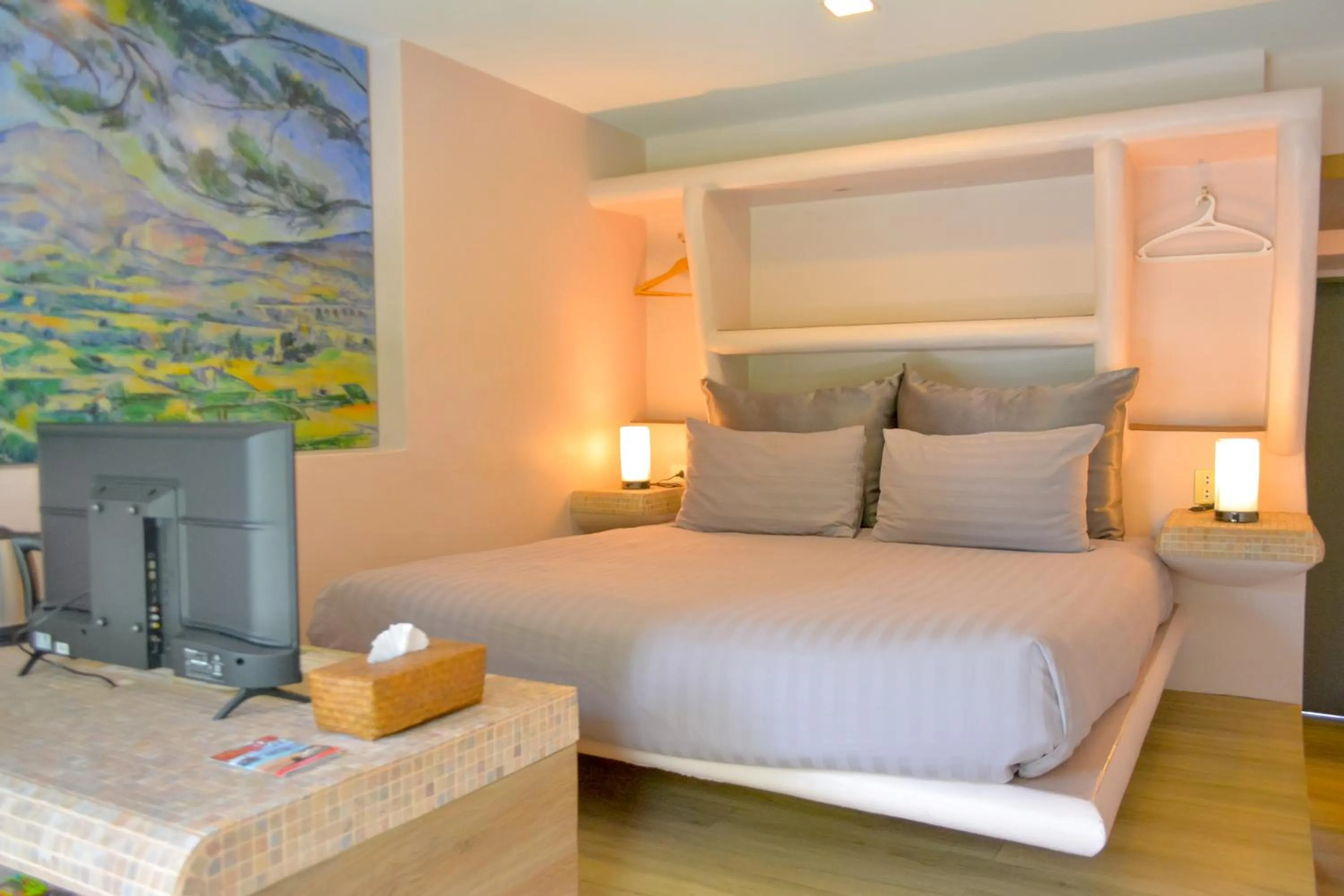 Bed in Le Divine Comedie Beach Resort