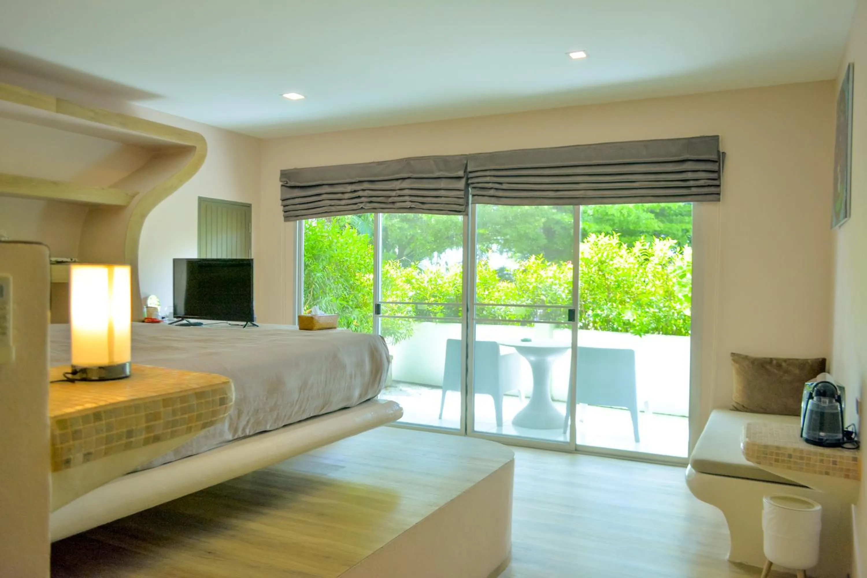 Bed in Le Divine Comedie Beach Resort