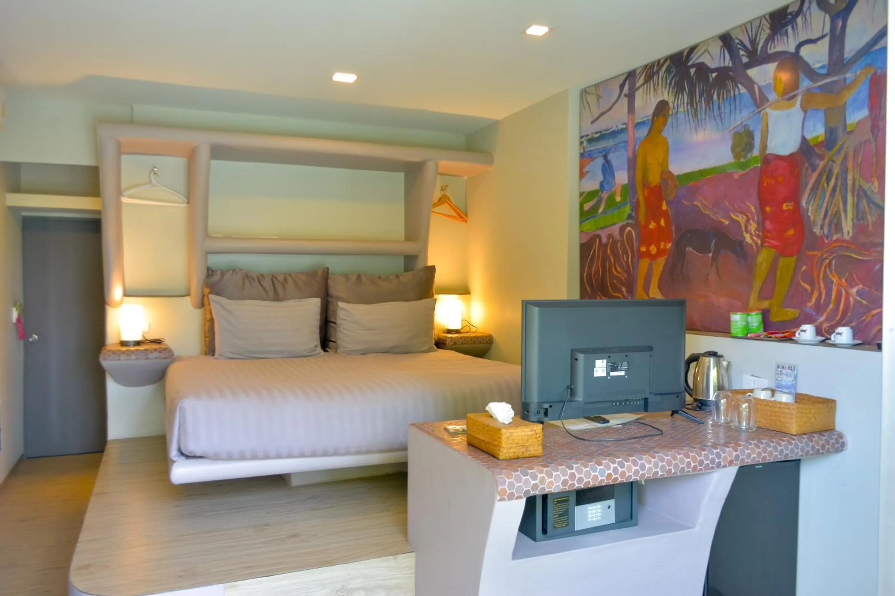 Bed in Le Divine Comedie Beach Resort