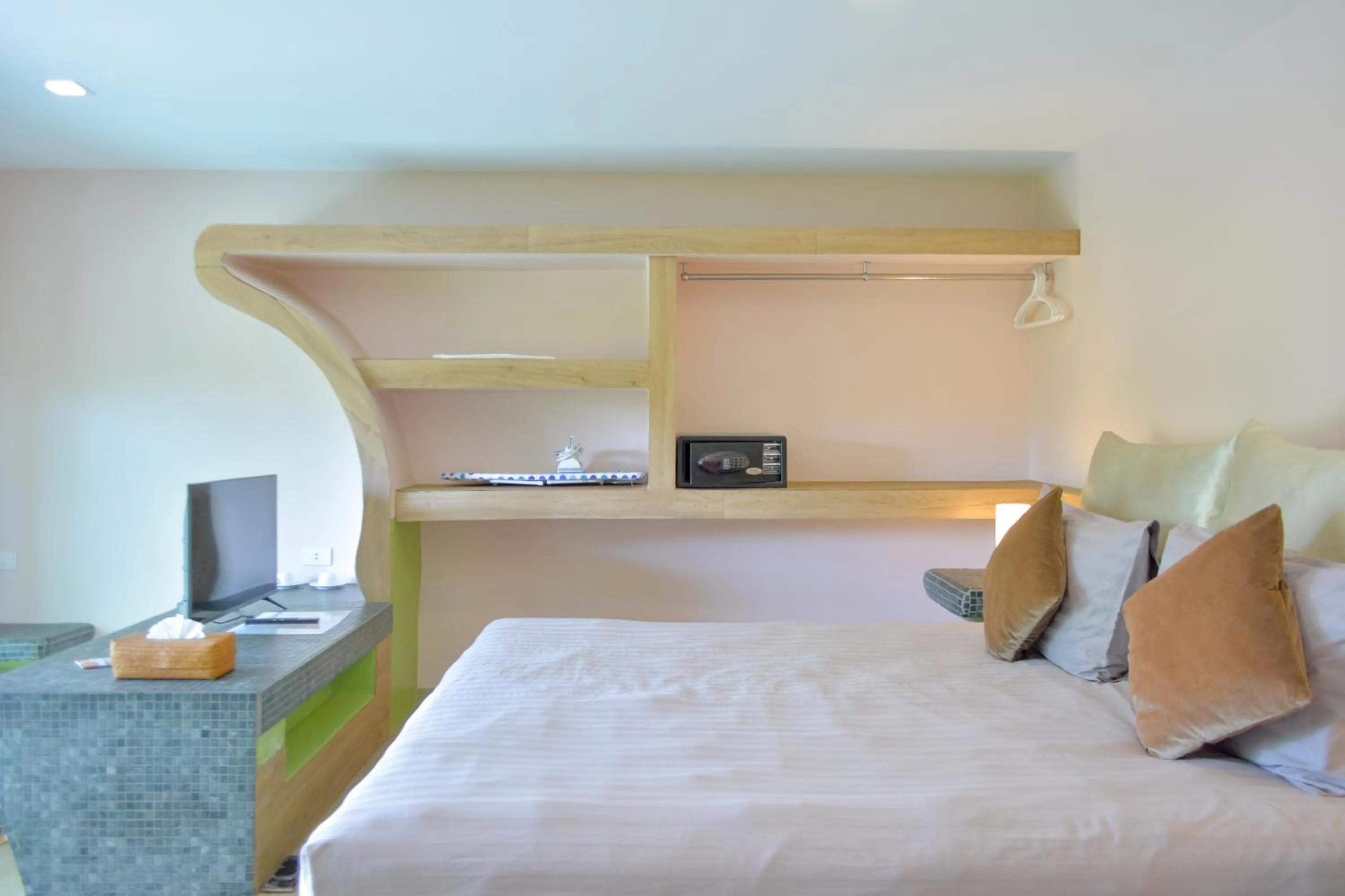 Bed in Le Divine Comedie Beach Resort