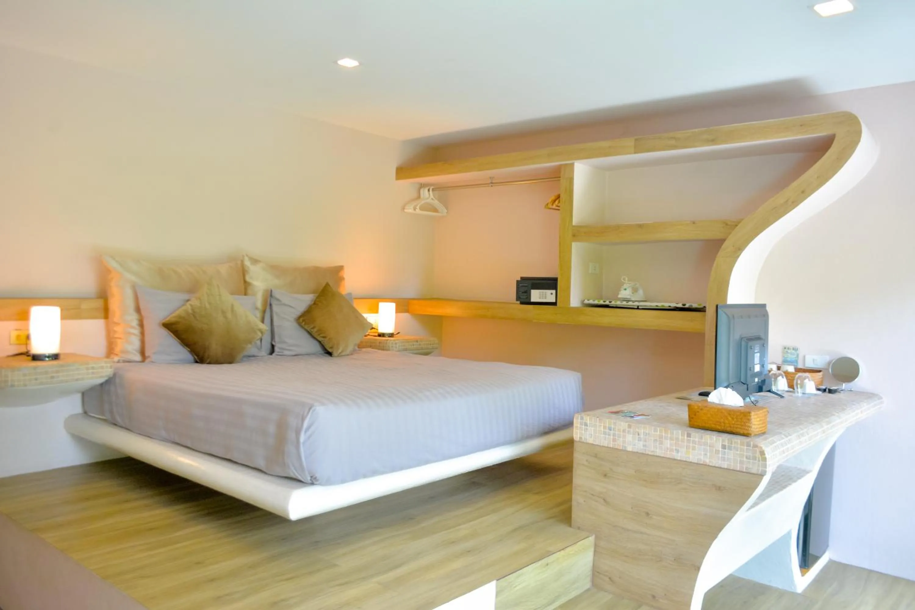 Bed in Le Divine Comedie Beach Resort