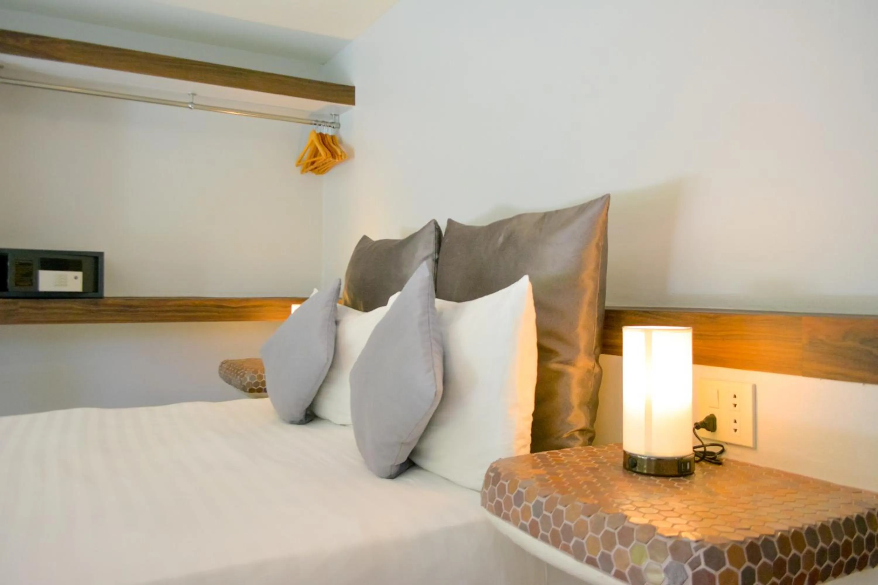 Bed in Le Divine Comedie Beach Resort