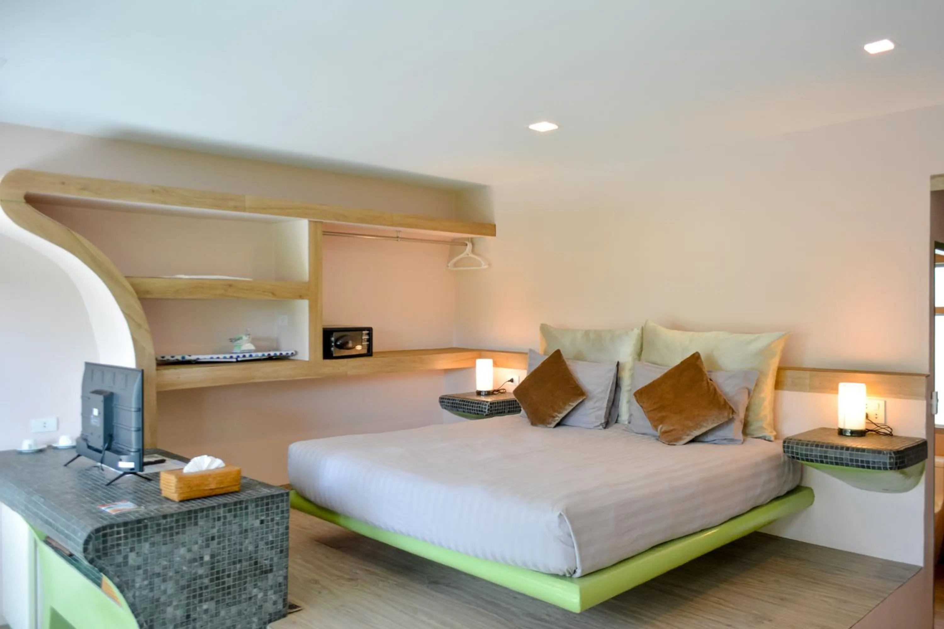 Bed in Le Divine Comedie Beach Resort