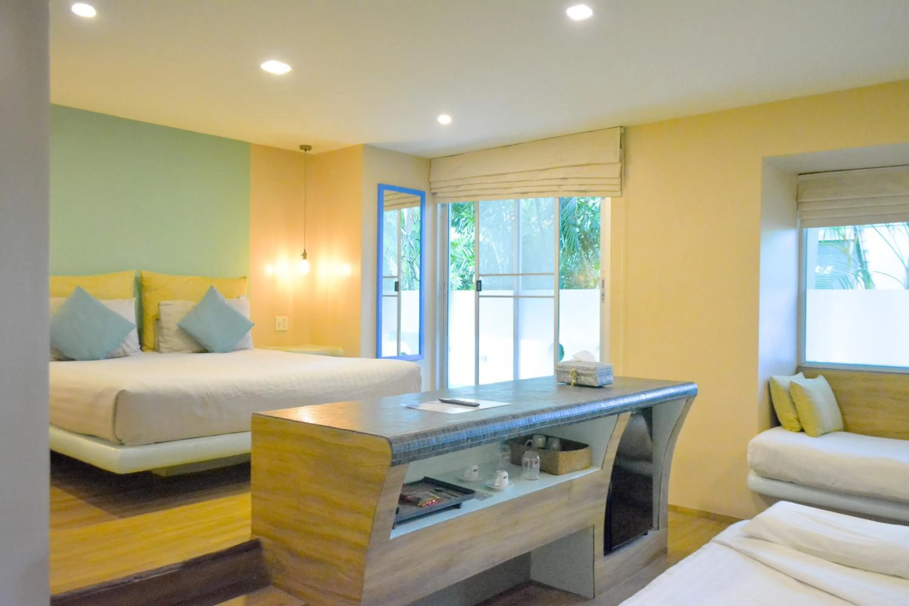 Bed in Le Divine Comedie Beach Resort