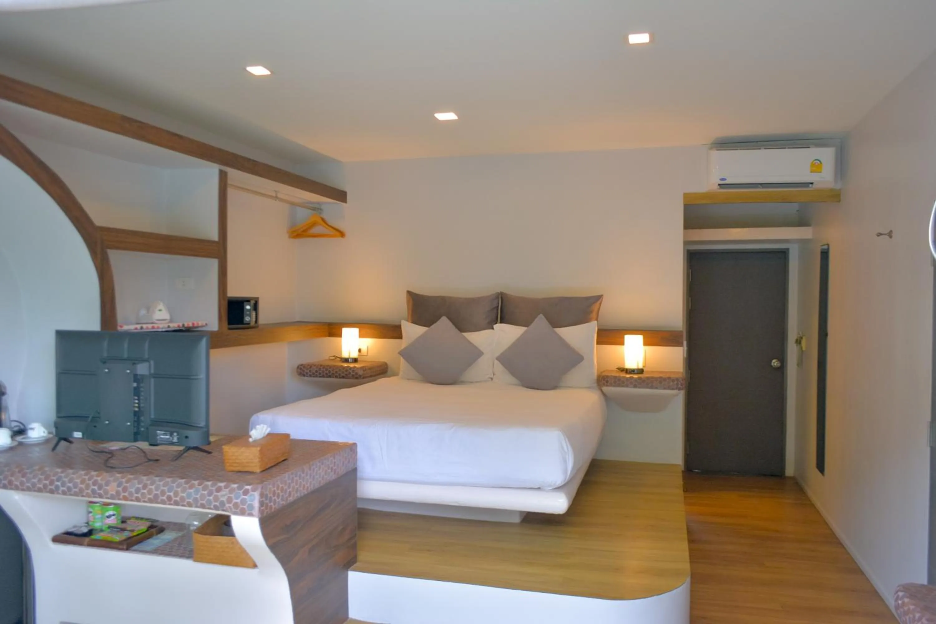 Bed in Le Divine Comedie Beach Resort