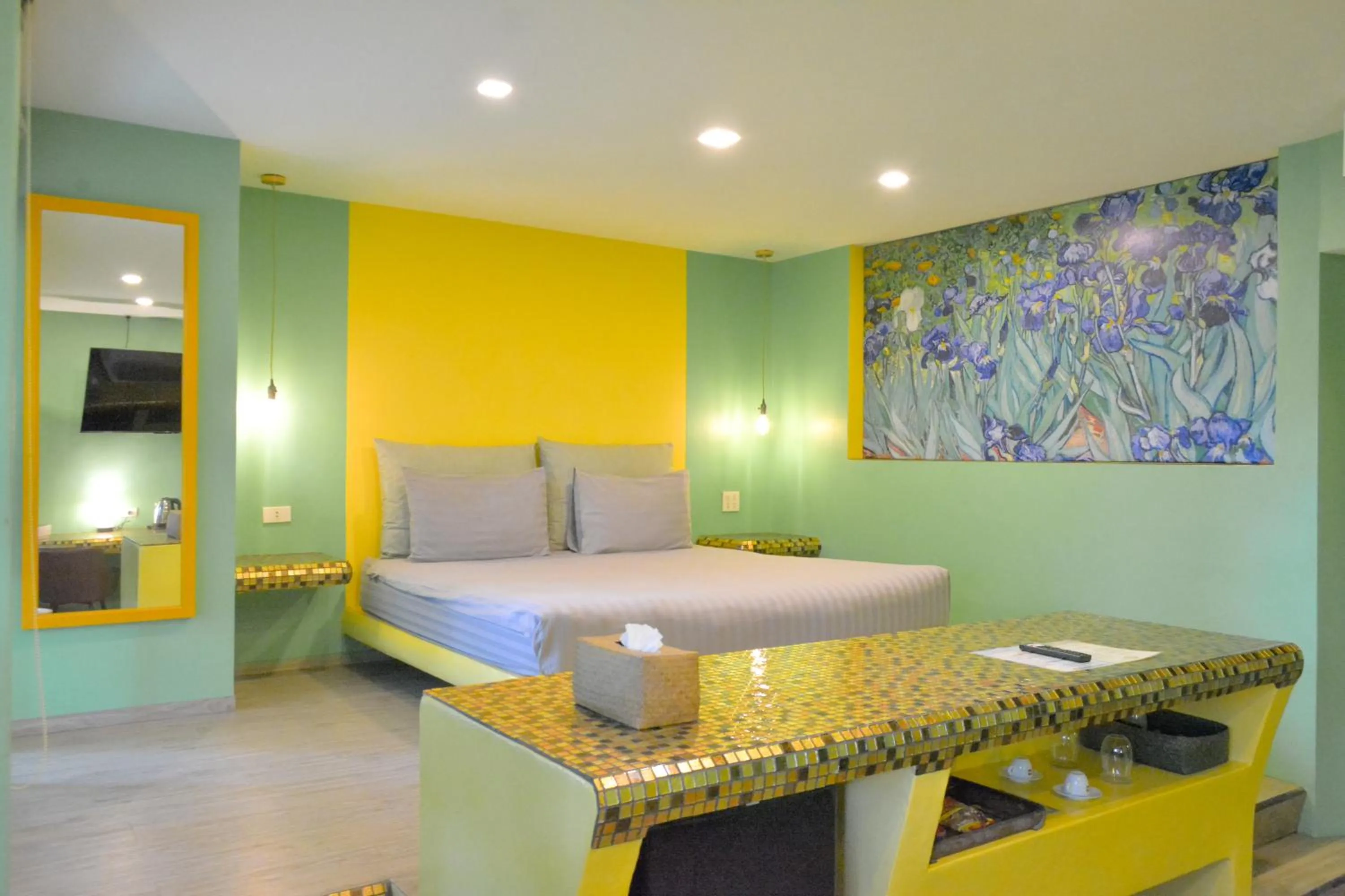 Bed in Le Divine Comedie Beach Resort