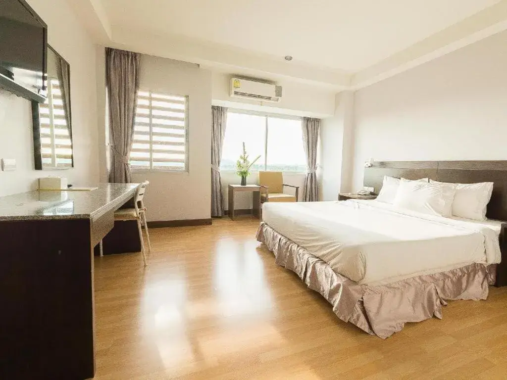 Bed in SinKiat Buri Hotel Bed in SinKiat Buri Hotel